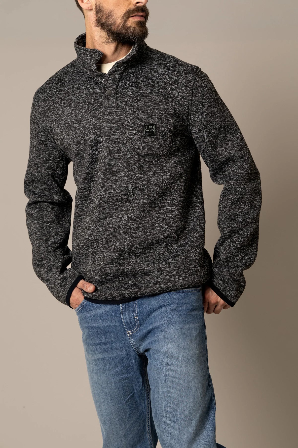 Kimes Ranch Julian Pullover sweatshirt in Black with a half-button placket and chest pocket with logo