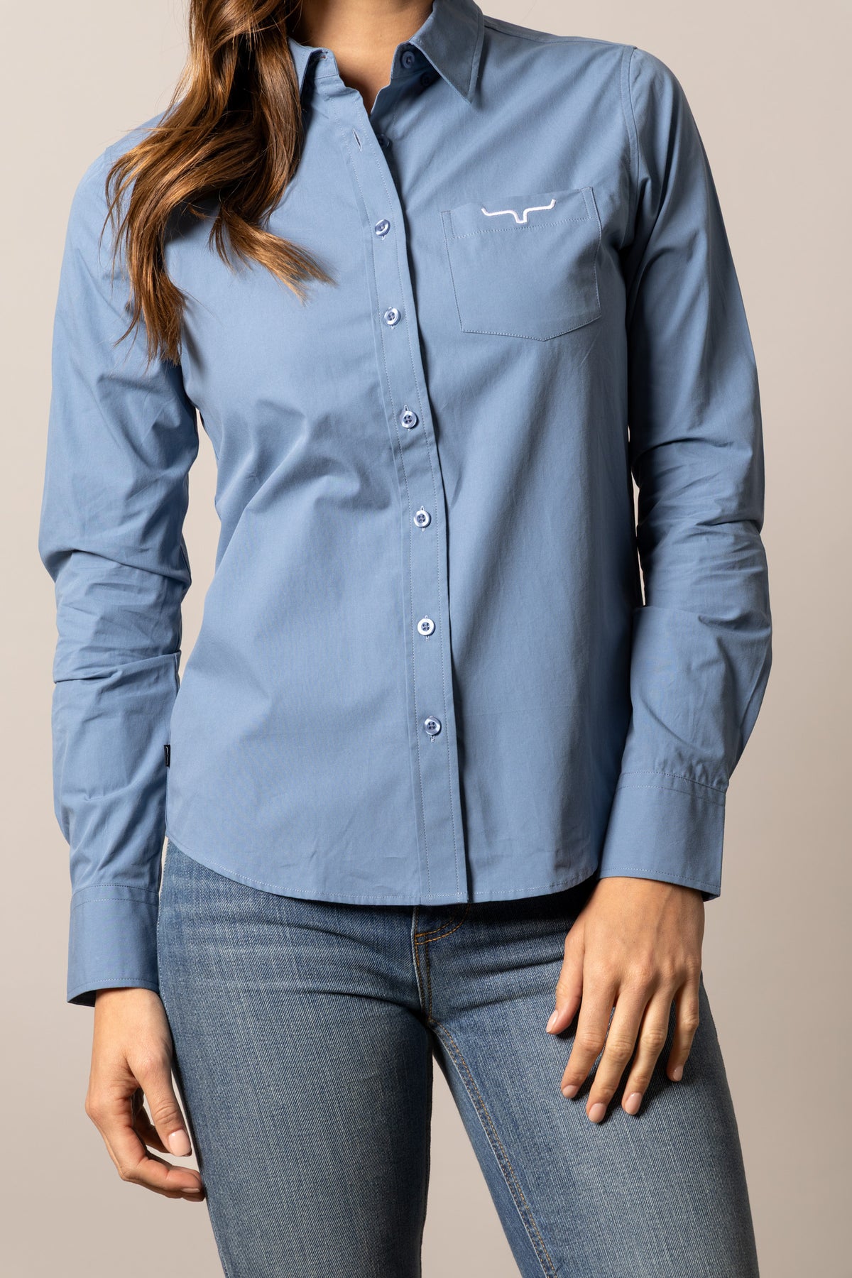 Kimes Ranch Ladies KR Team Shirt in Carbon Blue with long sleeves and a chest pocket with the Kimes Ranch logo