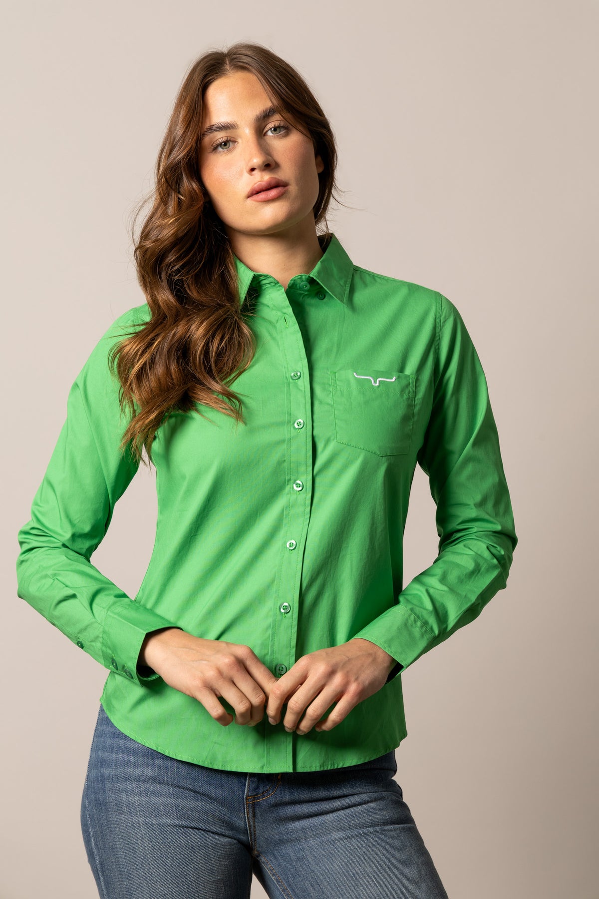 Kimes Ranch Ladies KR Team Shirt in Kelly Green with a front pocket and embroidered logo