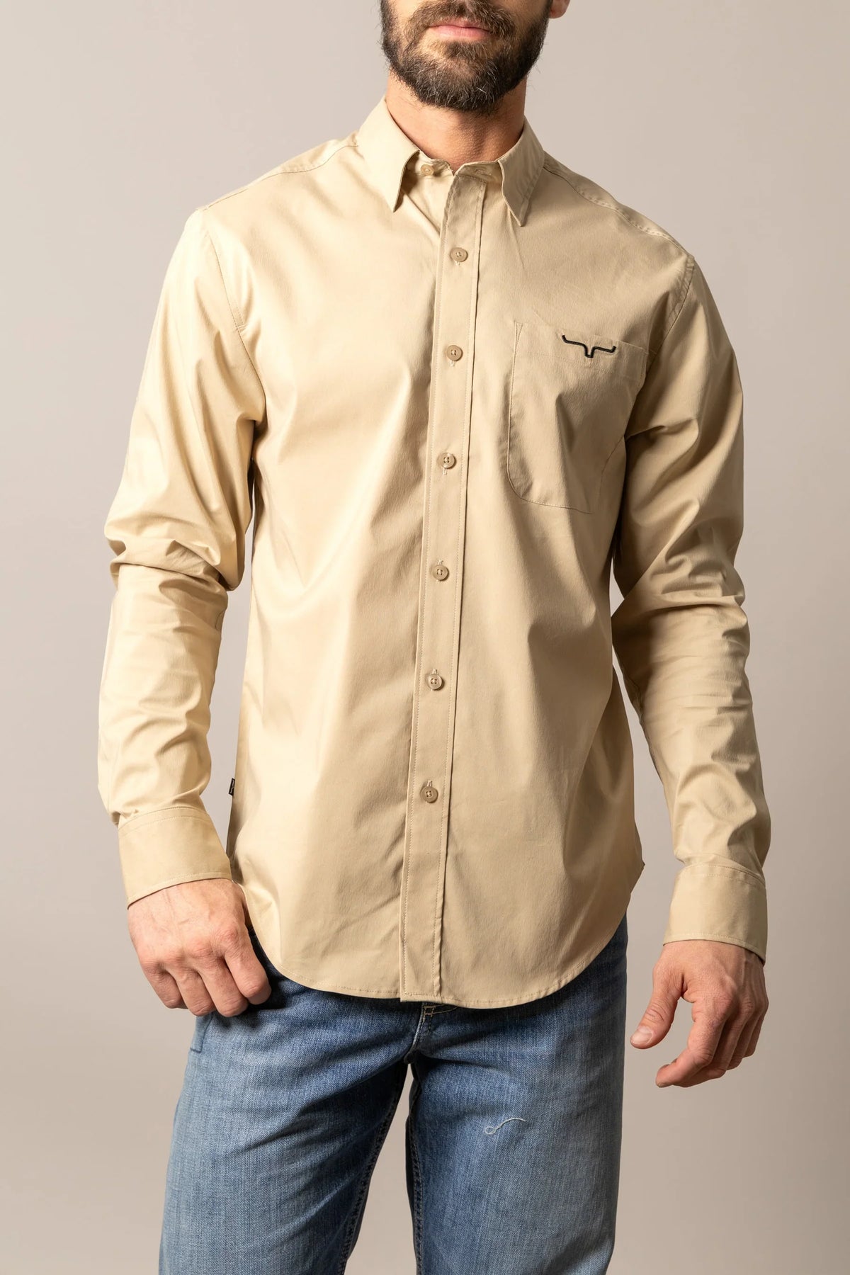Kimes Ranch KR Team Dress Shirt in Khaki with a button-down collar and chest pocket with the Kimes Ranch logo