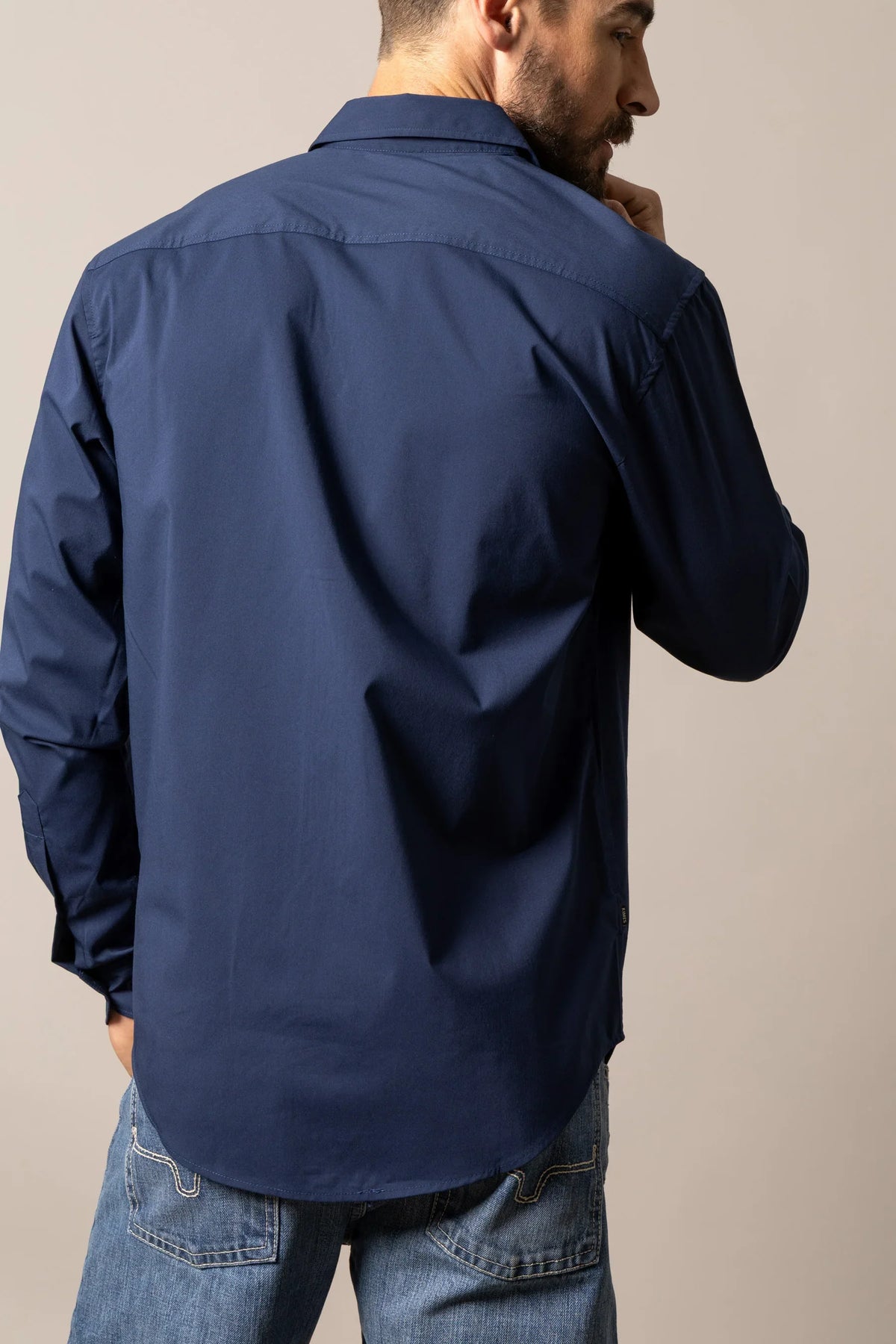 Kimes Ranch KR Team Dress Shirt in Navy, back view, with a back yoke and long sleeves