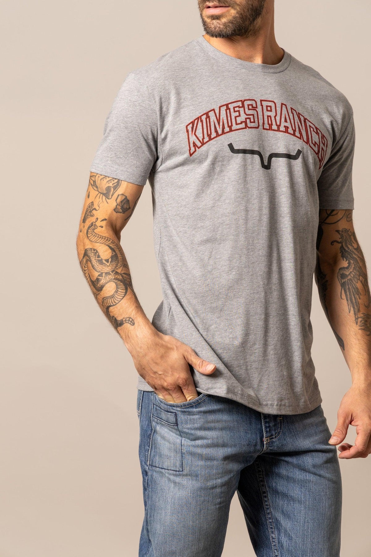 Kimes Ranch KR University Grey Heather t-shirt with arched Kimes Ranch logo and the Kimes Ranch logo mark