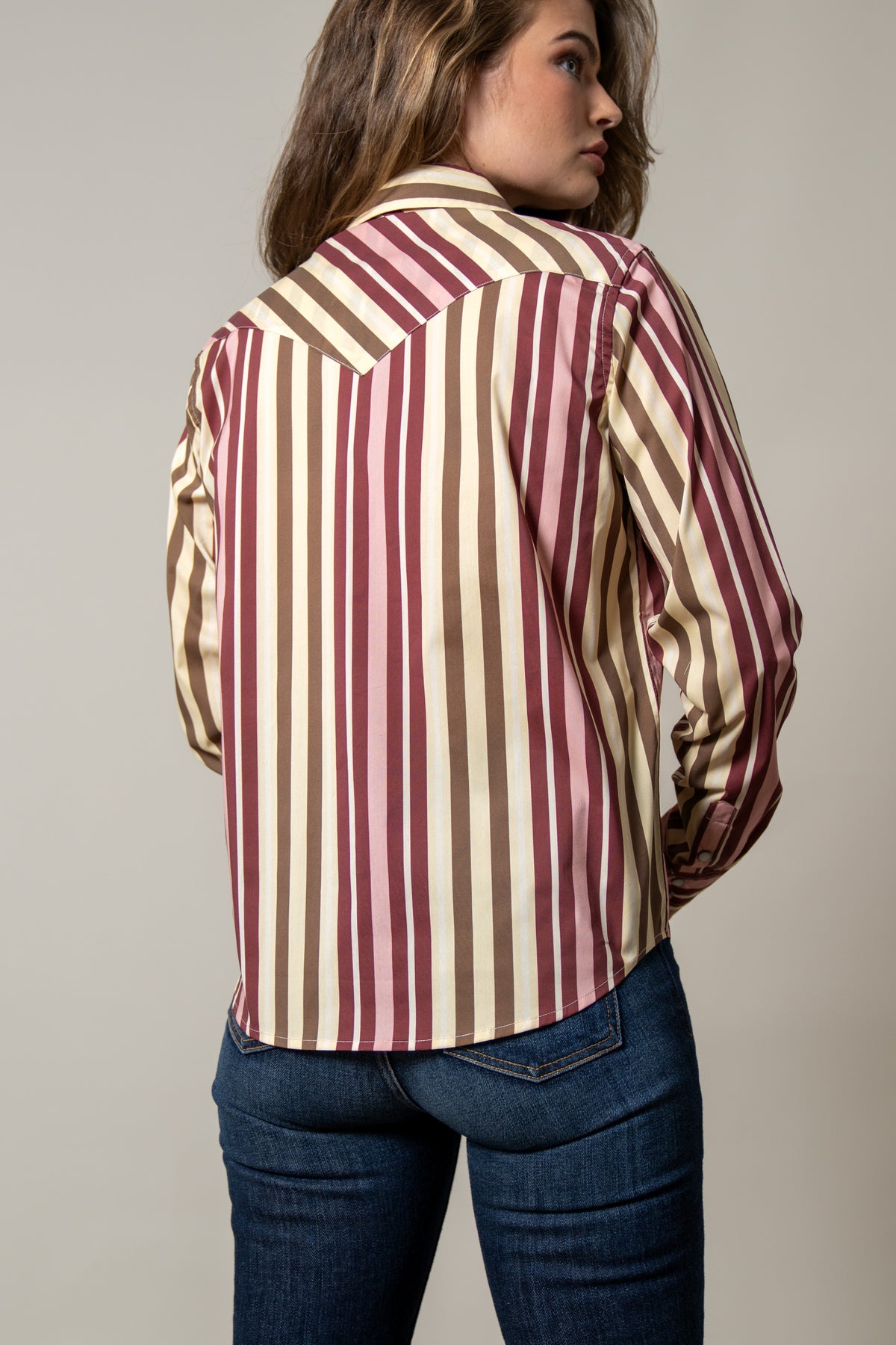Kimes Ranch Kai top in Maroon, back view, with vertical stripes and a yoke back