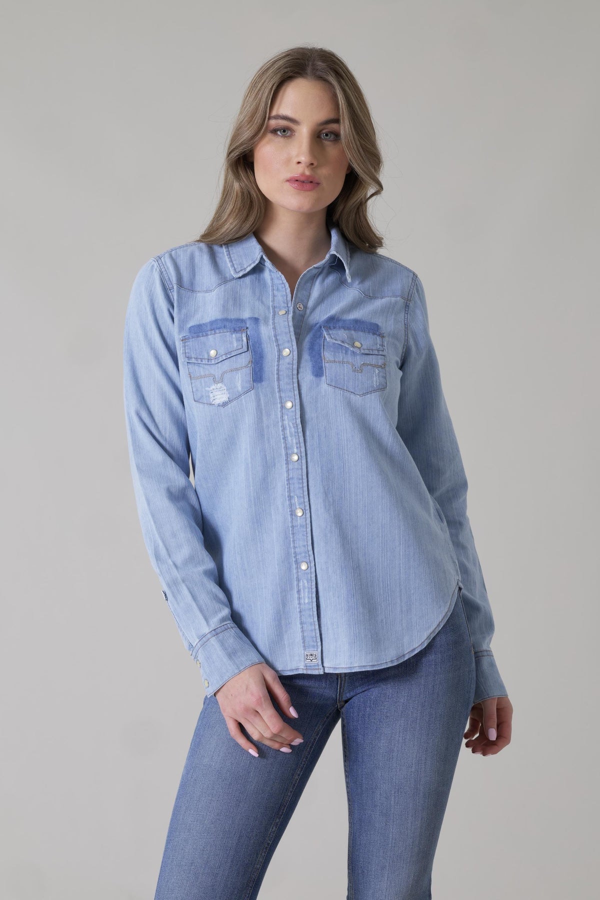 Kimes Ranch Kaycee Denim Top in Destroy Wash Denim with contrast stitching and distressed chest pockets