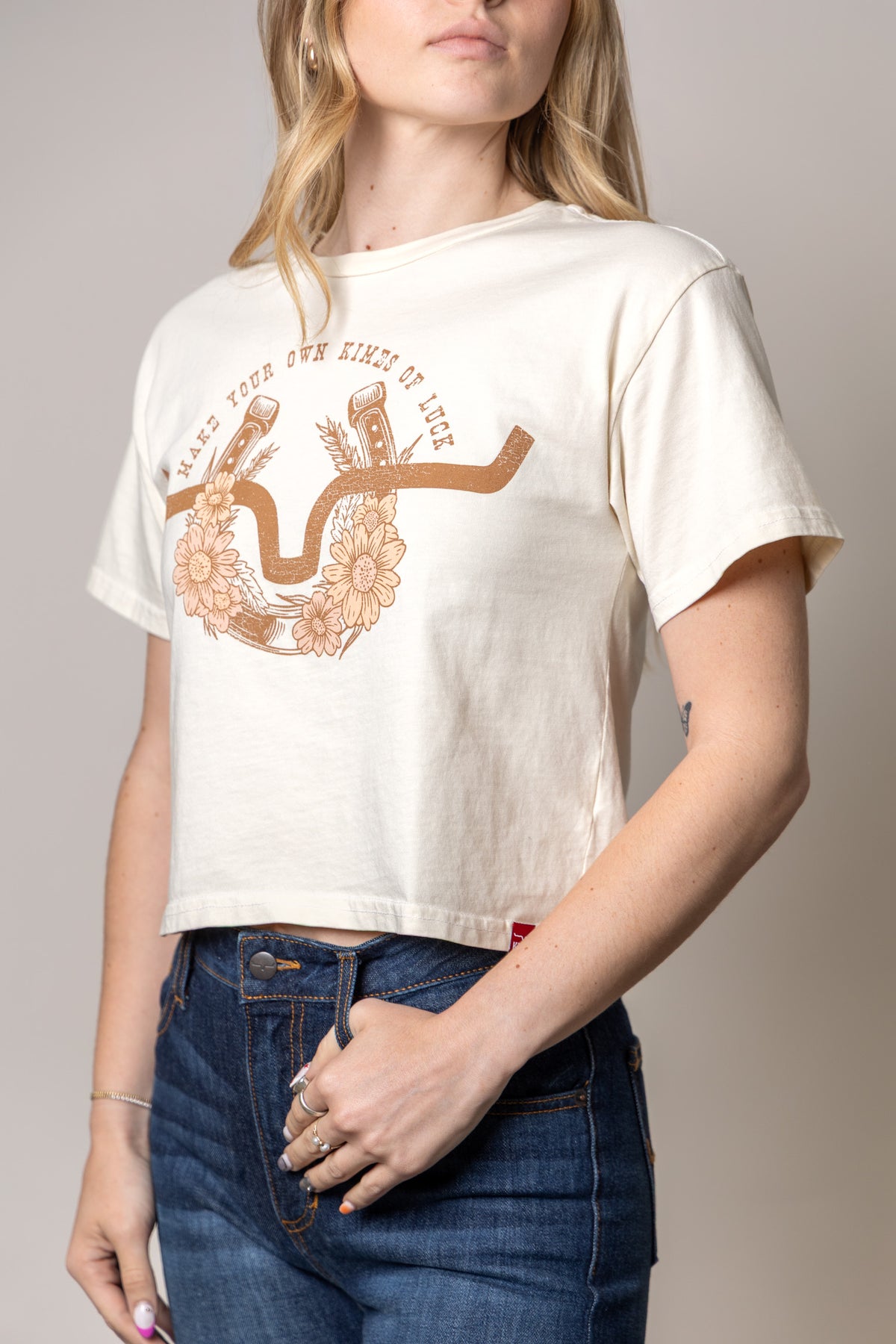 Kimes Ranch Kimes Of Luck shirt in Ivory with a horseshoe graphic and text reading MAKE YOUR OWN KIMES OF LUCK