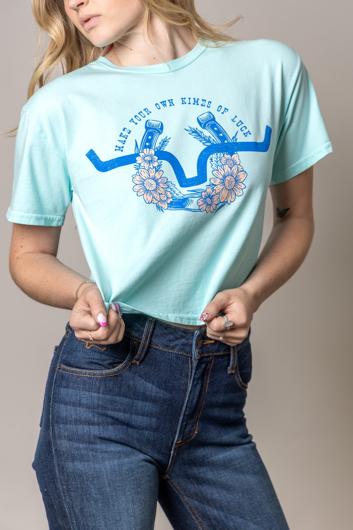 Kimes Ranch Kimes Of Luck shirt in Mint with a blue graphic of crossed horseshoes and flowers