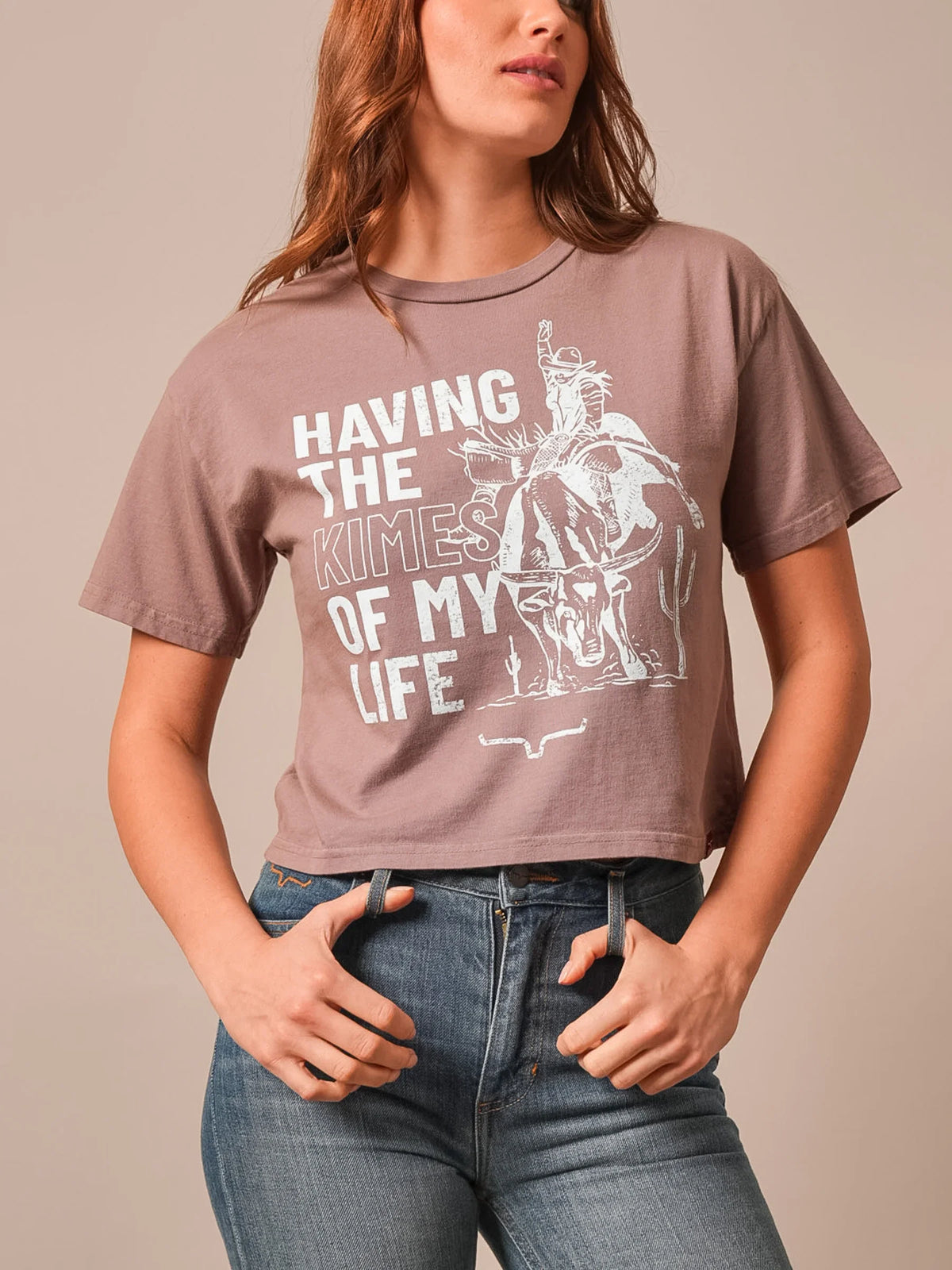 Kimes Ranch Kimes Of My Life shirt in Mocha with a cowboy riding a steer and the text Having The Kimes Of My Life