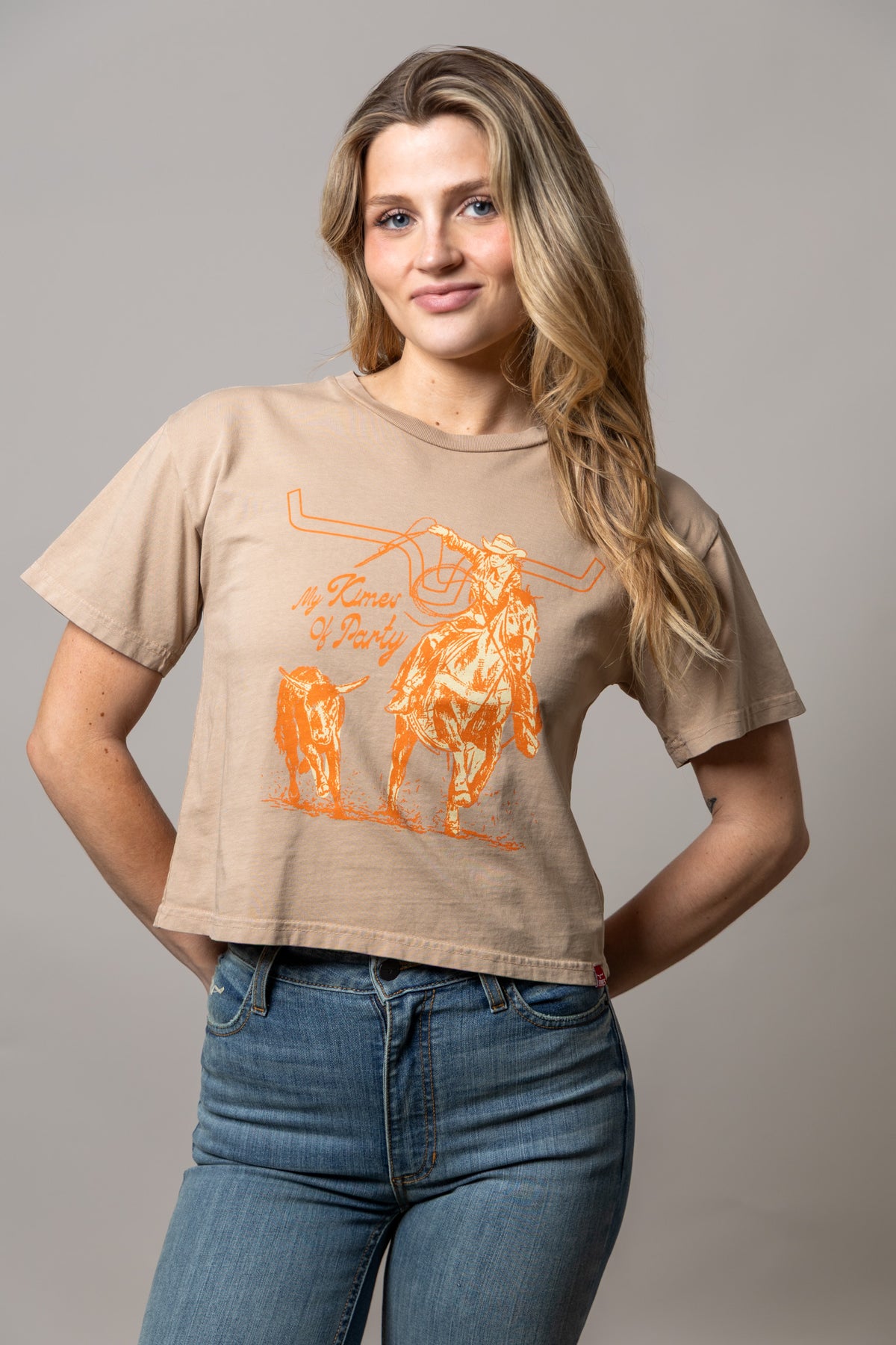 Kimes Of A Party short sleeve shirt in Tan with a cowboy on horseback and a steer graphic