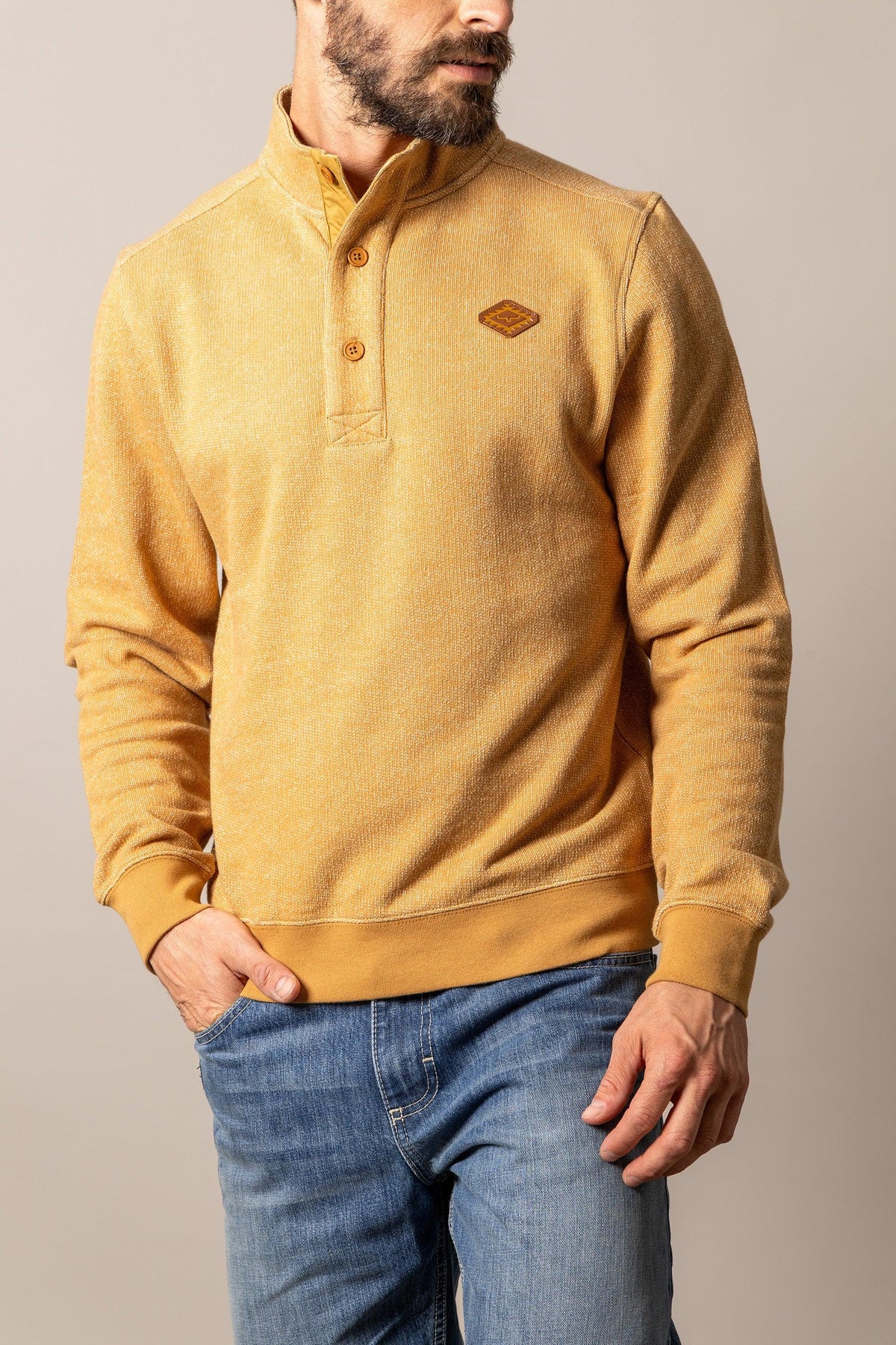 Kimes Ranch Kingswell sweatshirt in Work Wear Brown with a half-button placket and Kimes Ranch logo patch