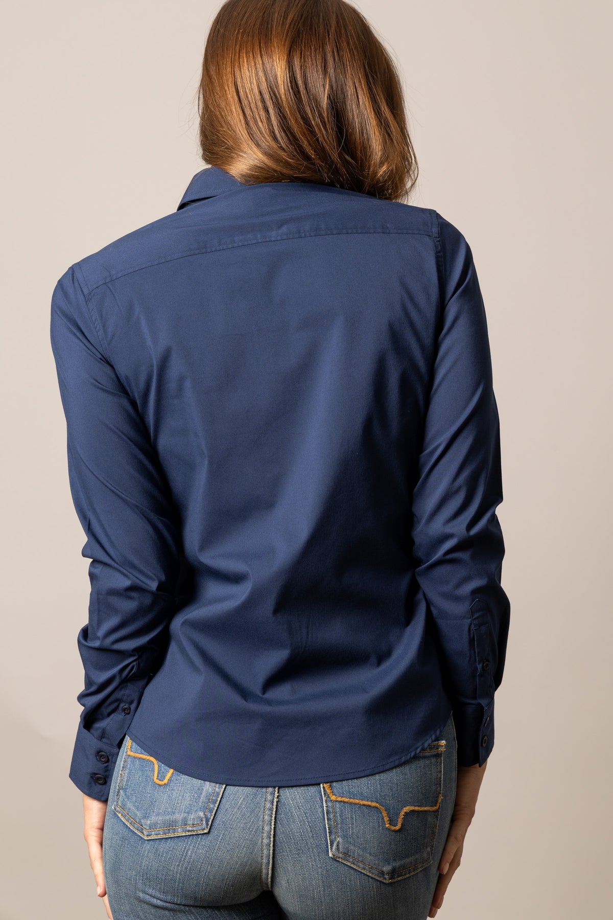 Kimes Ranch Ladies KR Team Shirt in Navy, back view, with long sleeves and button cuffs