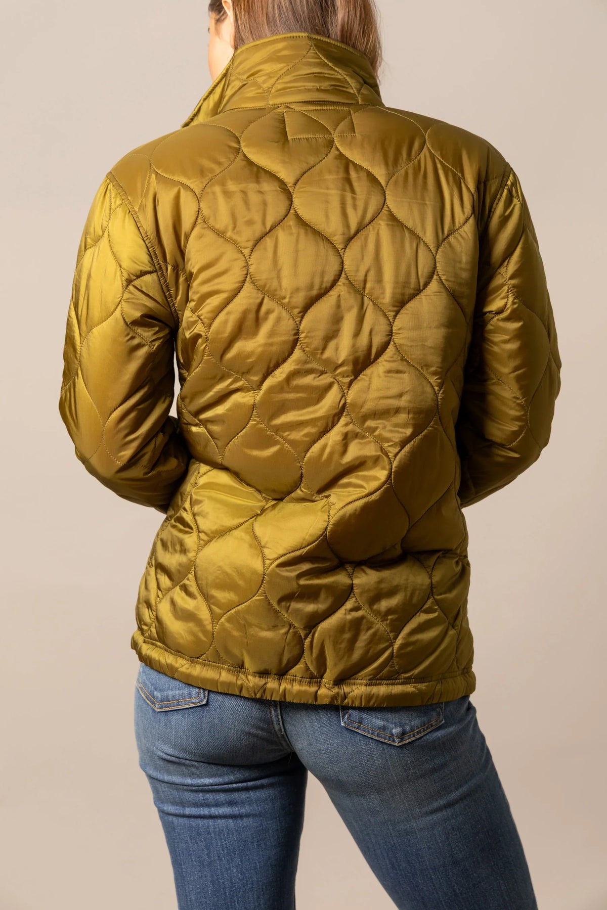 Kimes Ranch Lara Jacket in Olive, back view, with a high collar and a wavy quilted pattern