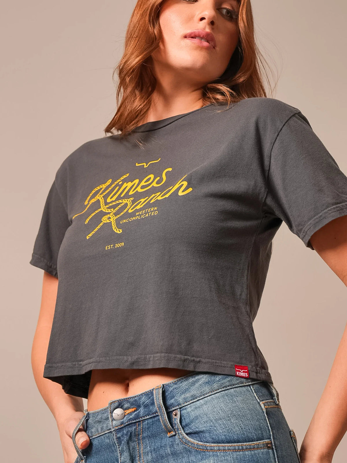 Kimes Ranch Lasso Script shirt in Graphite with a yellow rope script graphic and Western Uncomplicated text