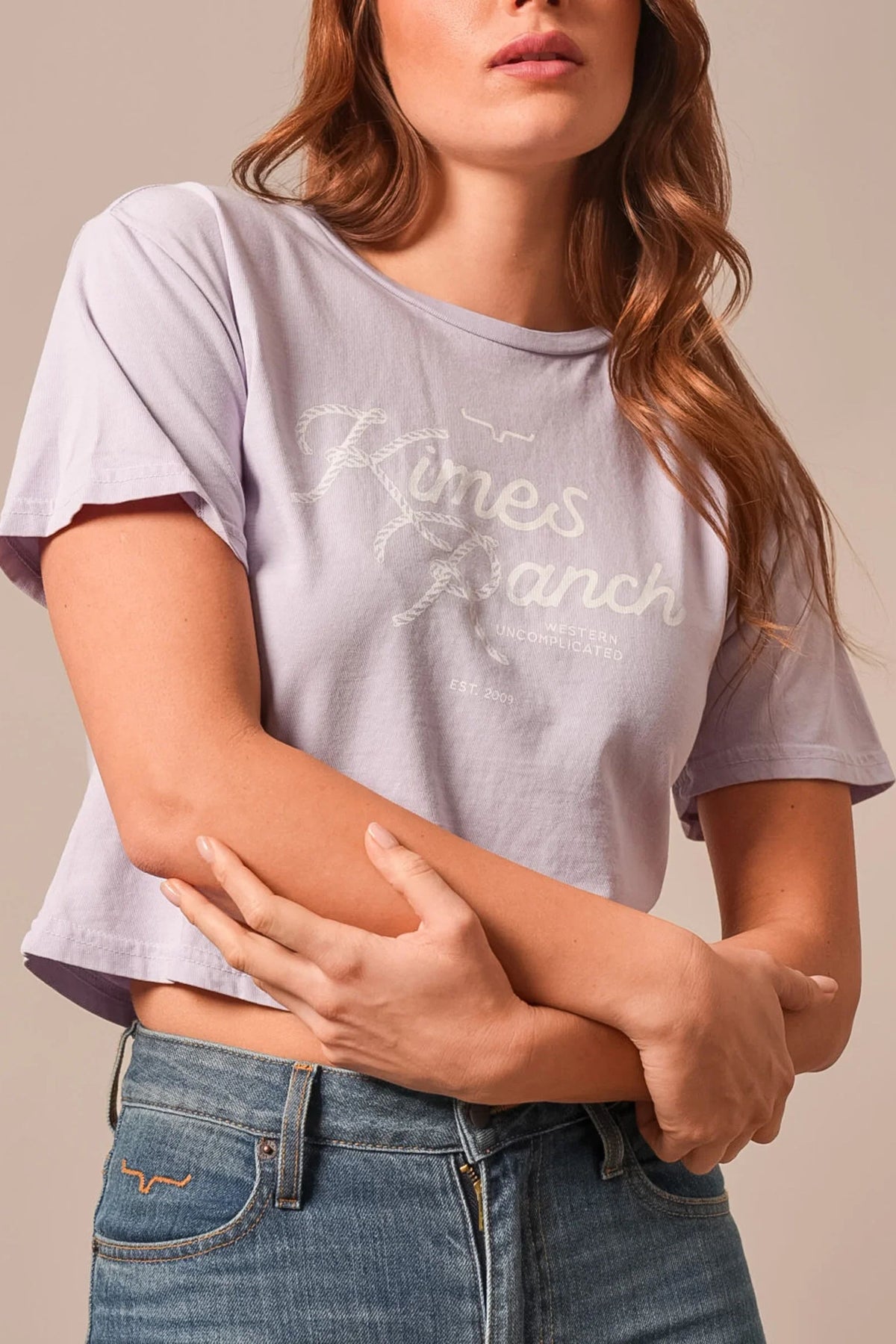 Kimes Ranch Lasso Script shirt in Lavender with a rope-style logo graphic and Western Uncomplicated text