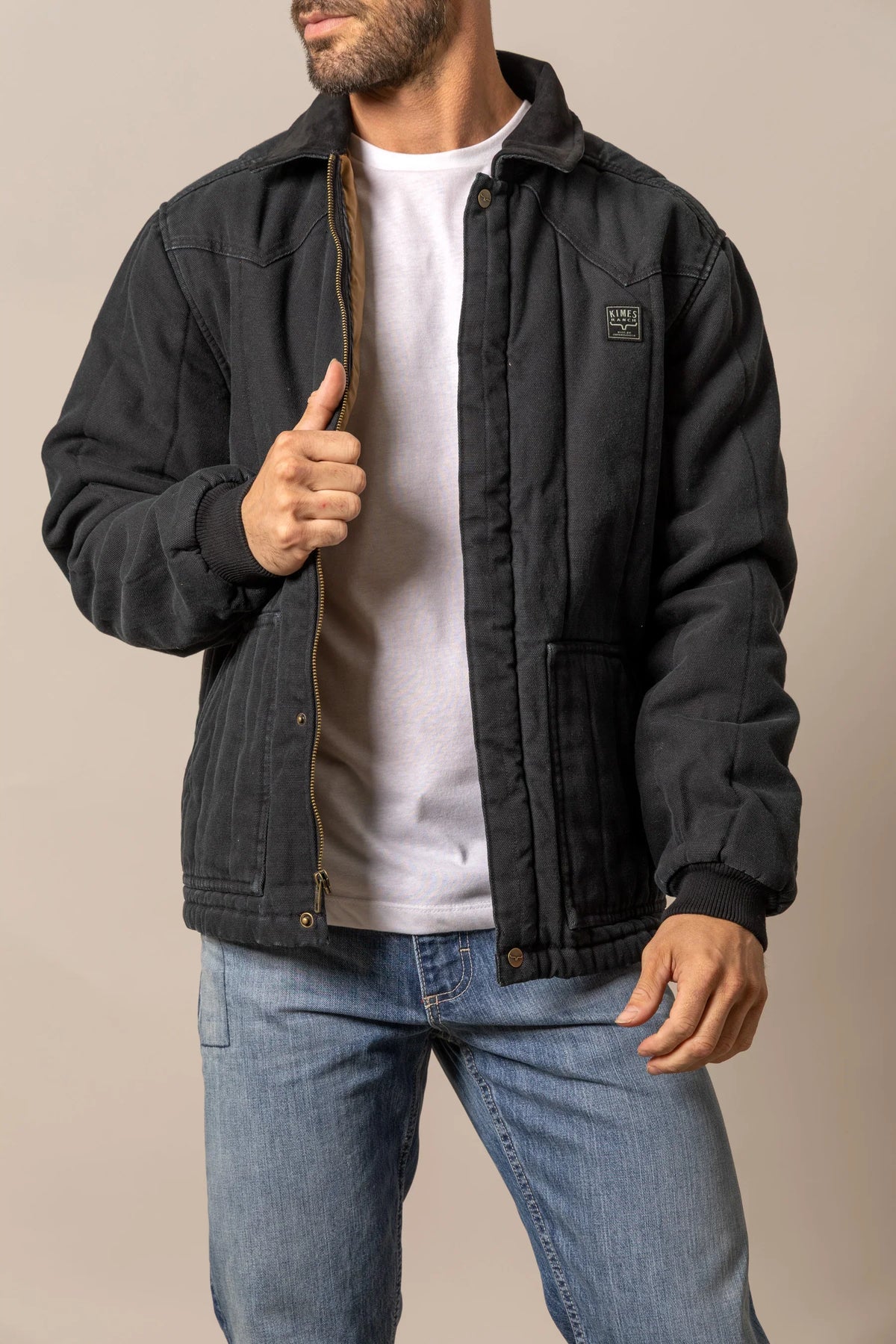 Kimes Ranch Lewiston Jacket in Black with a zip front, front pockets, and the Kimes Ranch logo on the chest
