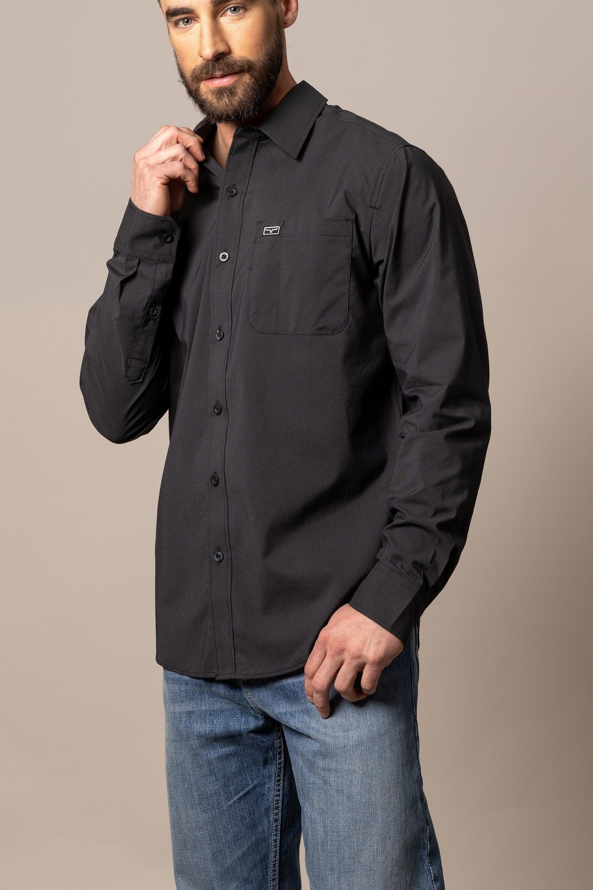 Kimes Ranch Linville Long Sleeve Dress Shirt in Black with a chest pocket and logo