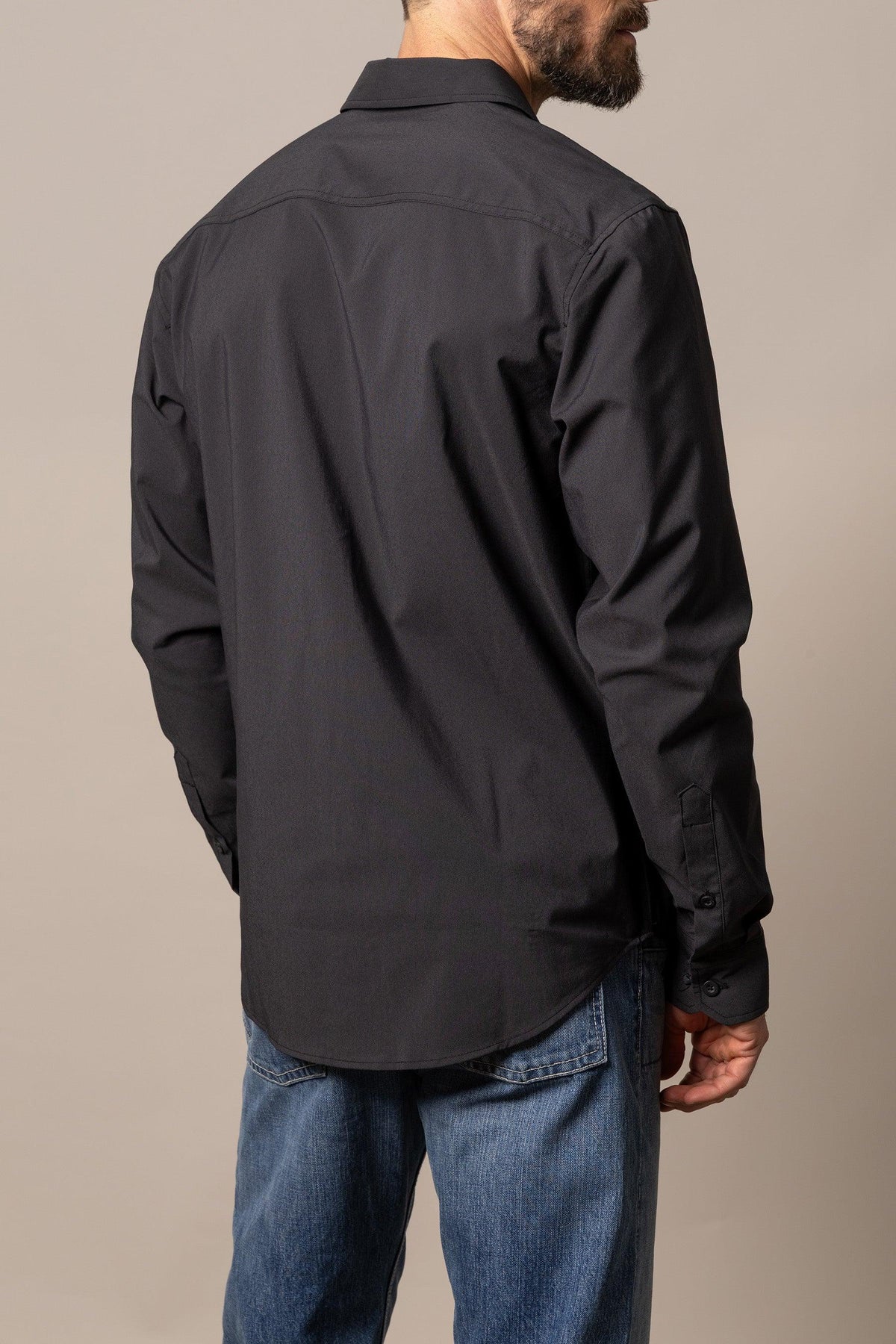 Kimes Ranch Linville Long Sleeve Dress Shirt in Black, back view, with a back yoke and button cuffs