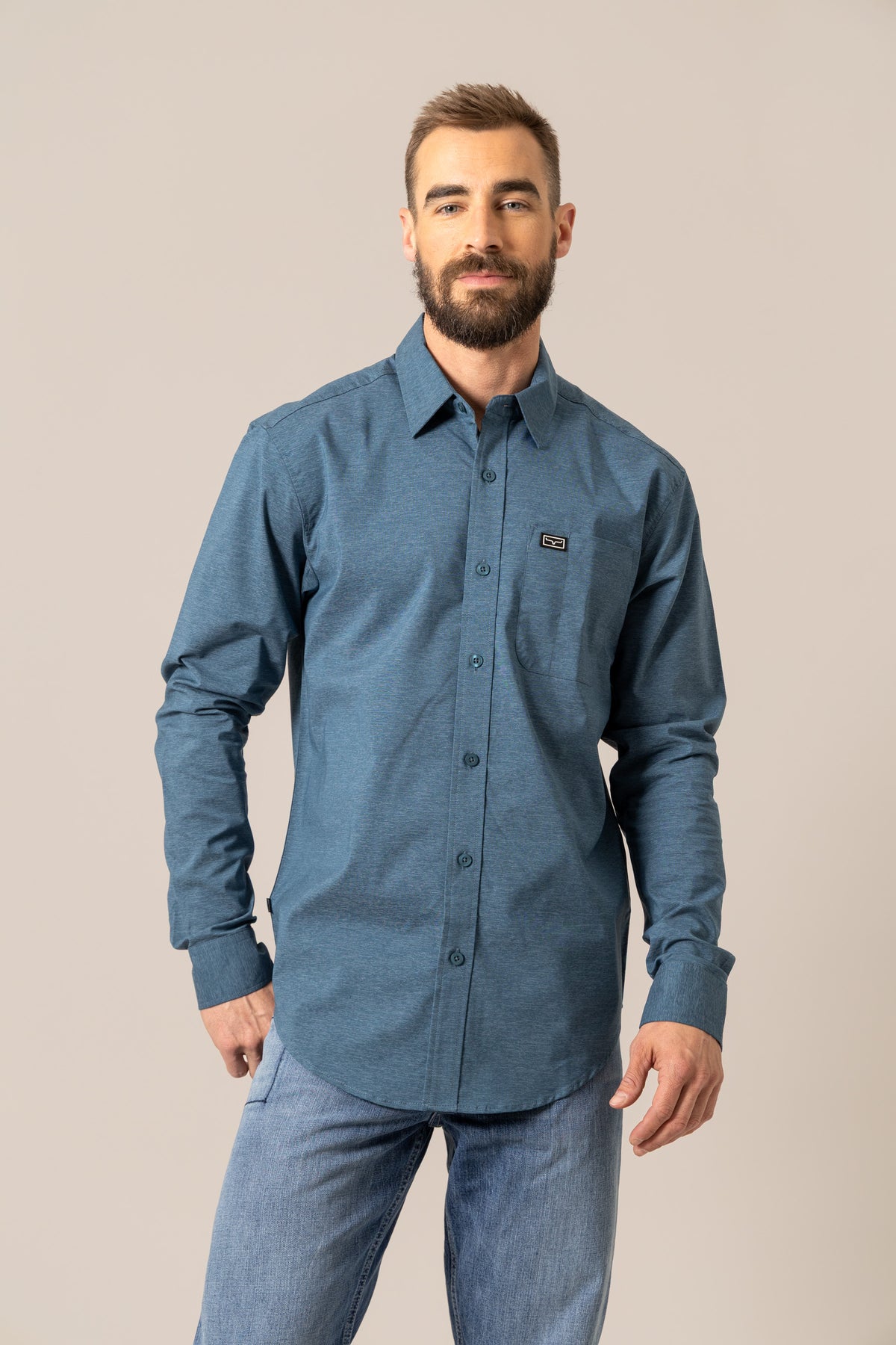Kimes Ranch Linville Long Sleeve Dress Shirt in Dark Blue with a chest pocket and logo