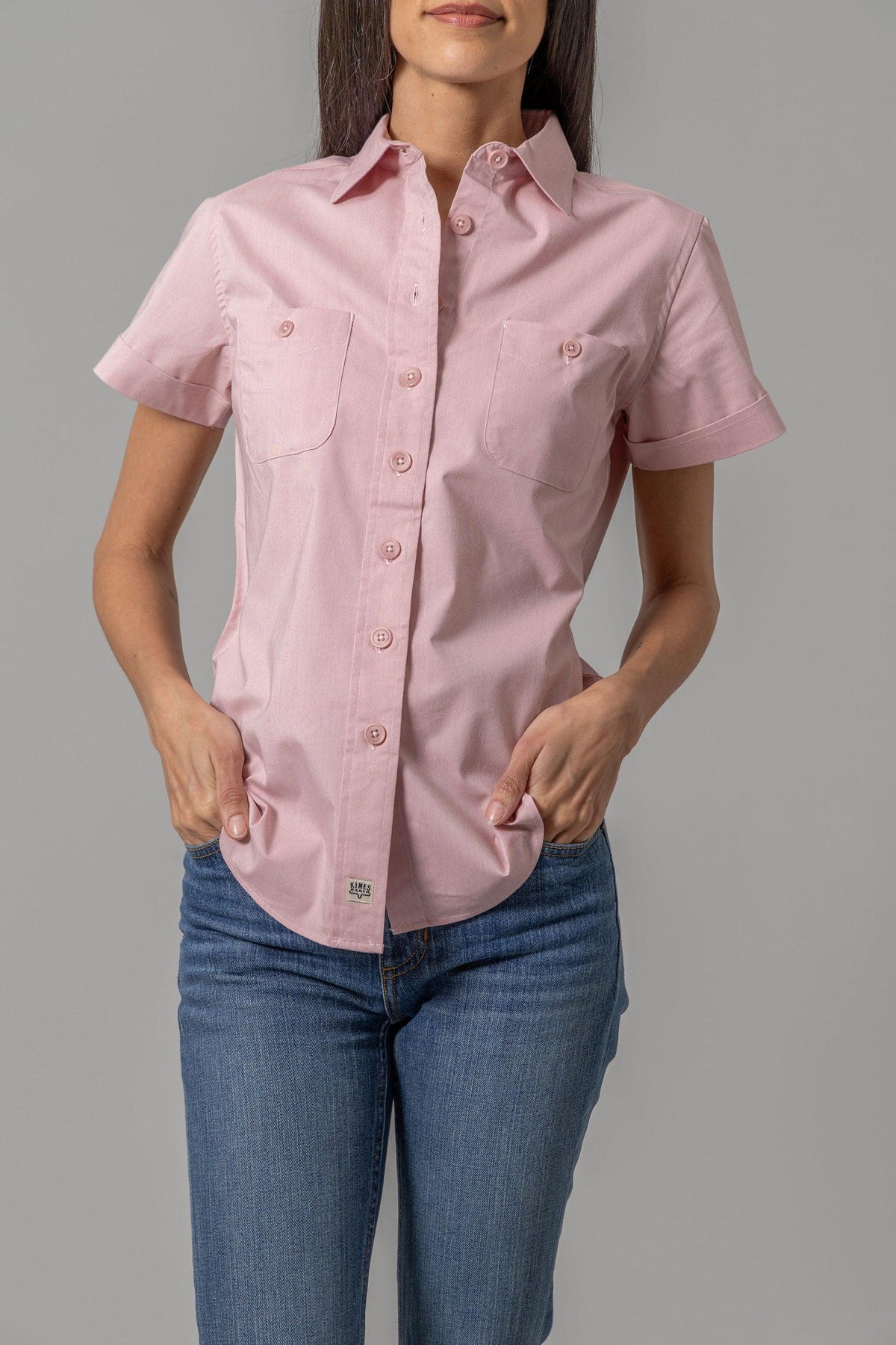 Kimes Ranch Ladies Linville Short Sleeve top in Pink with a button front and two chest pockets