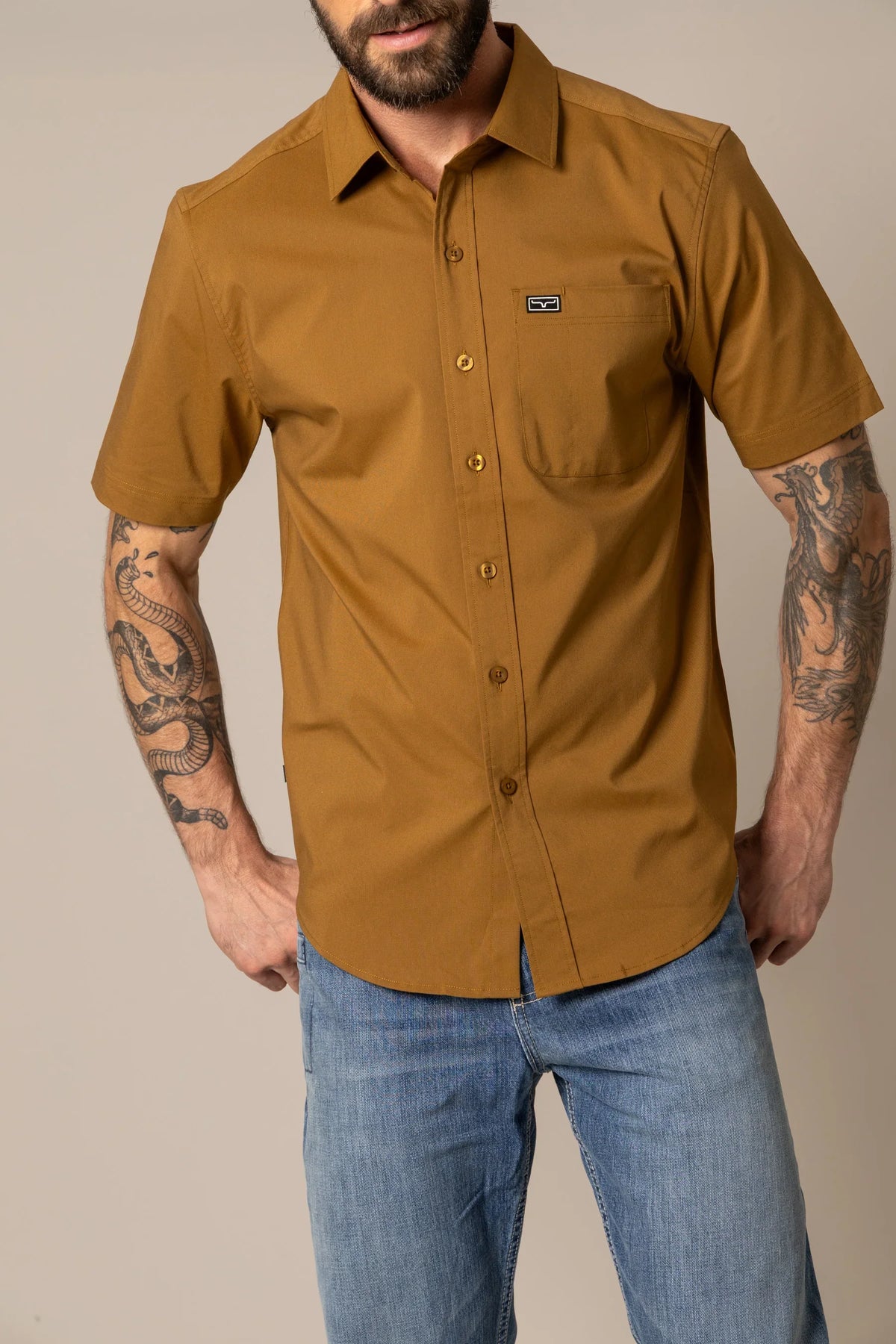 Kimes Ranch Linville Short Sleeve Dress Shirt in Work Wear Brown with a chest pocket and logo patch