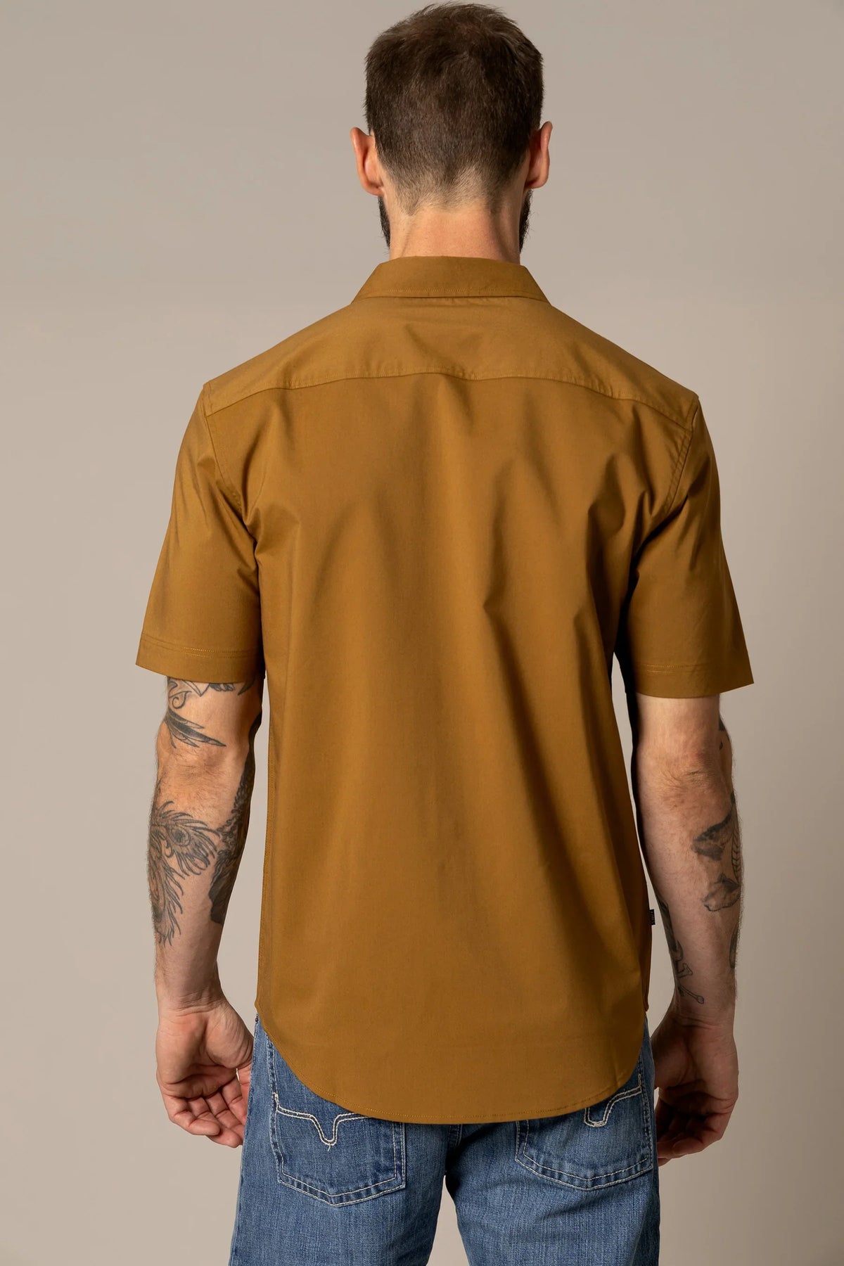 Kimes Ranch Linville Short Sleeve Dress Shirt in Work Wear Brown, back view, with a back yoke and short sleeves