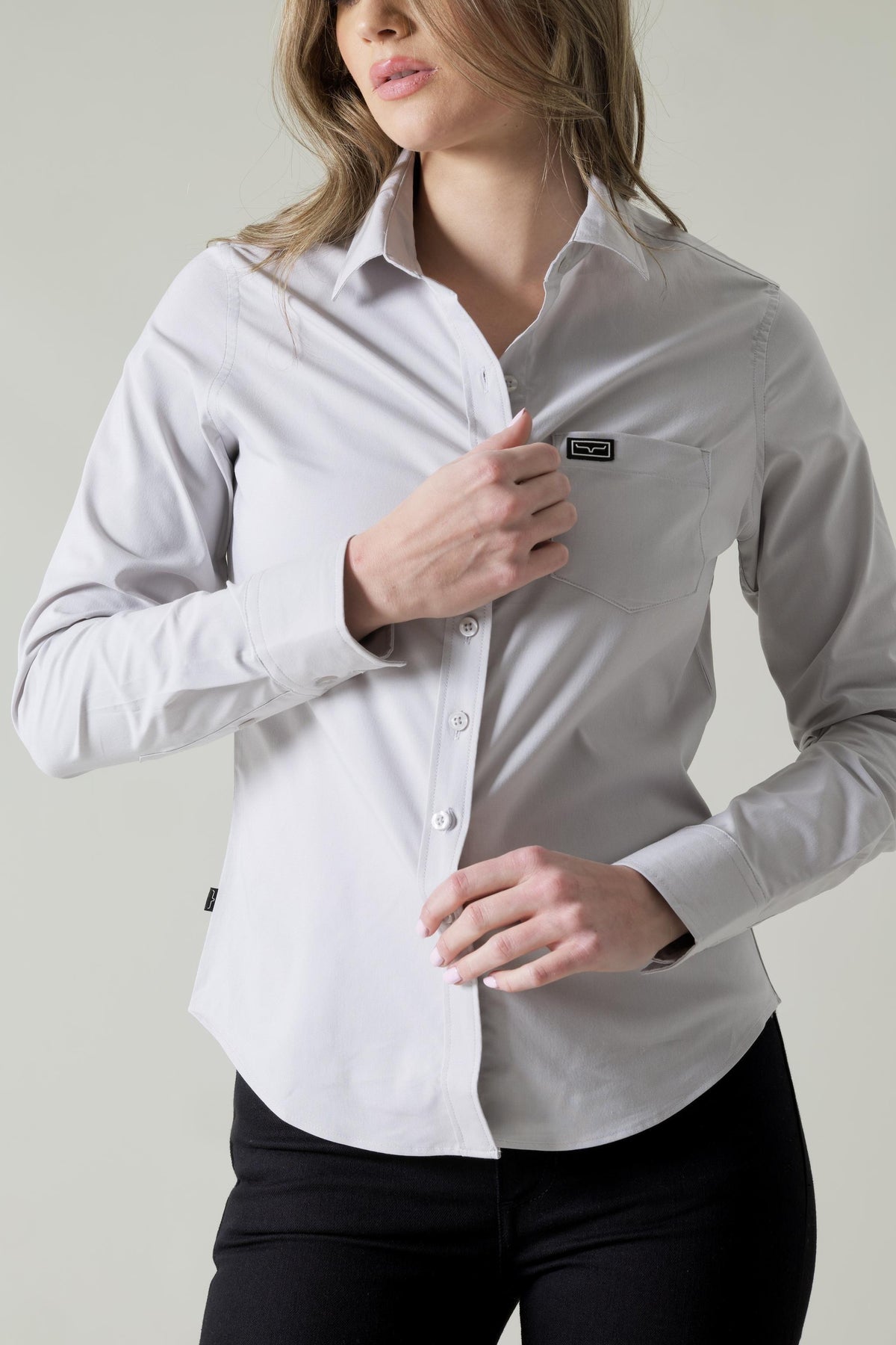 Kimes Ranch Ladies Linville top in Silver White with a chest pocket and Kimes Ranch logo