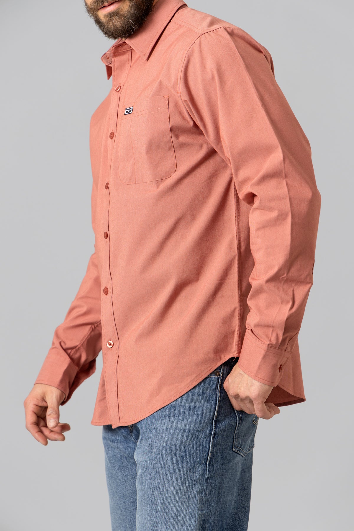 Kimes Ranch Linville Long Sleeve Dress Shirt in Red, side view, with a chest pocket and logo patch