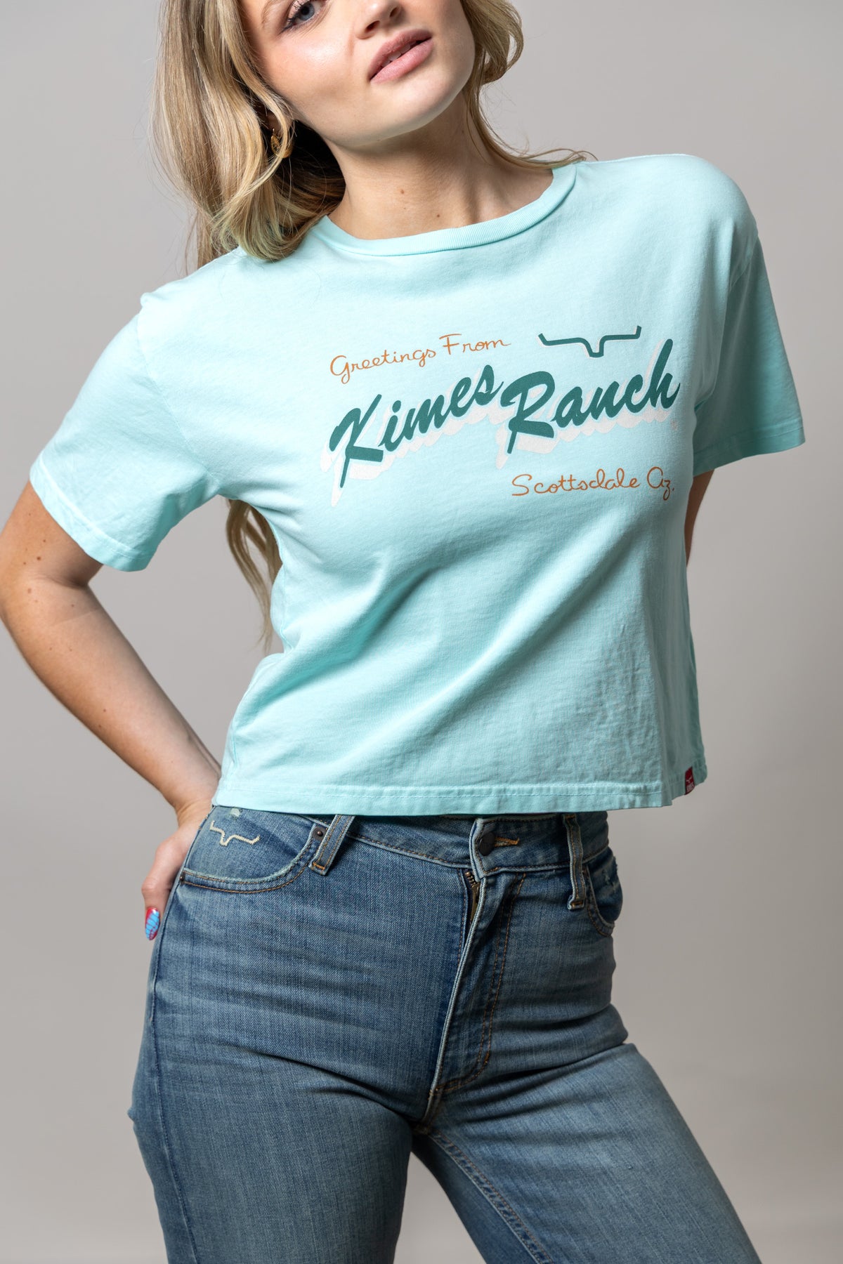 Kimes Ranch Lucky B Greetings shirt in Mint with a vintage script graphic reading Greetings From Kimes Ranch Scottsdale Az