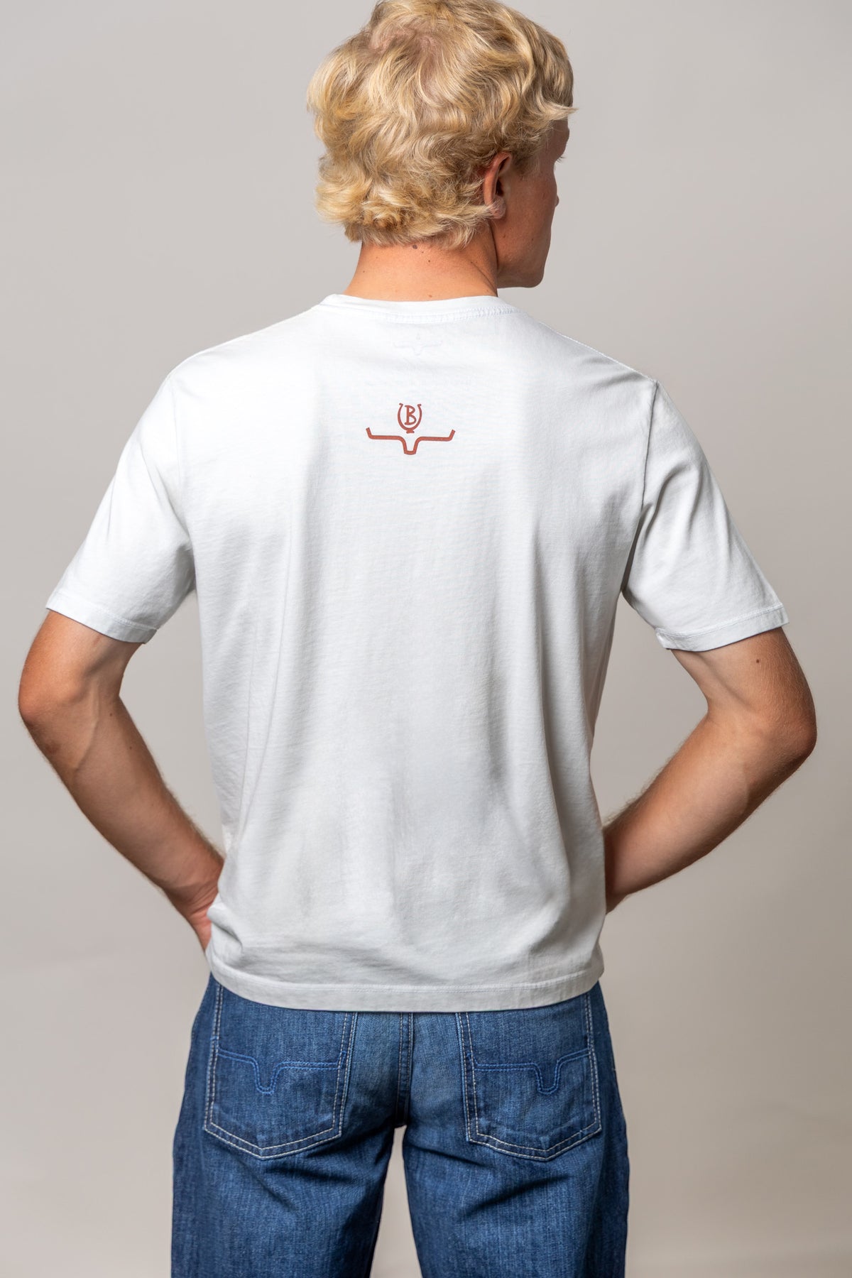 Kimes Ranch Lucky B Greetings shirt in Natural, back view, with a small red logo on the back yoke
