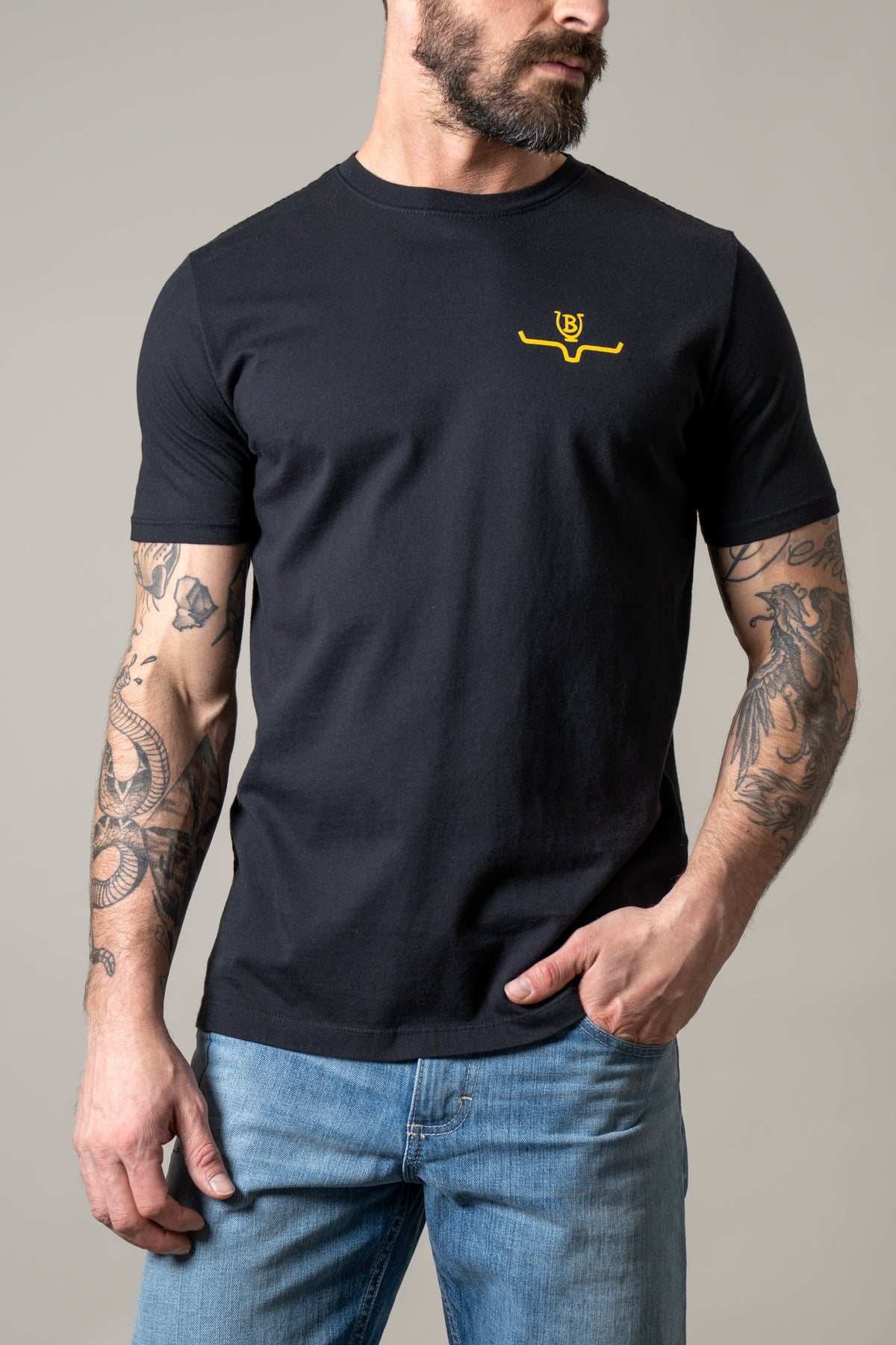 Kimes Ranch Lucky B Iron shirt in Black with a small yellow logo on the chest