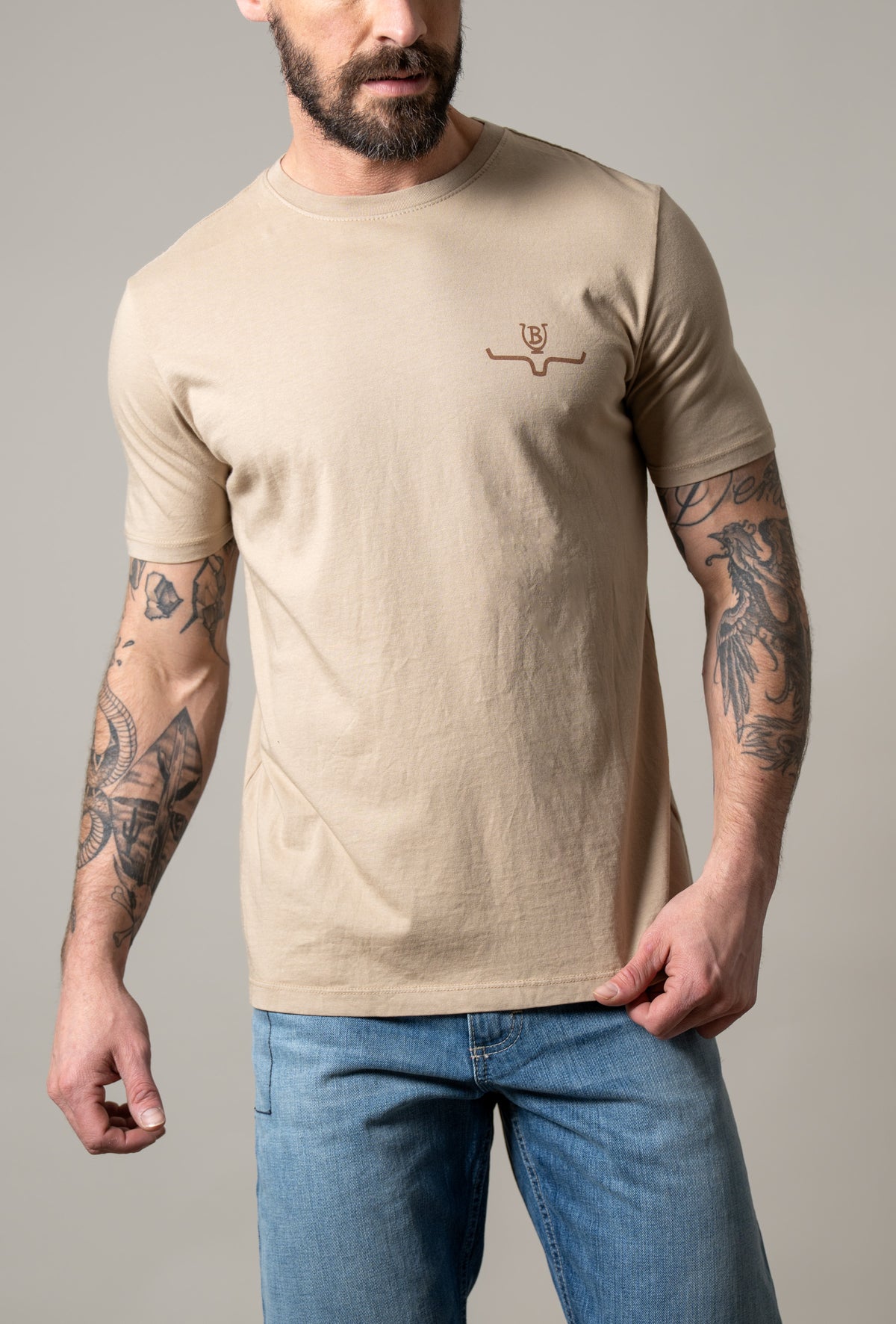 Kimes Ranch Lucky B Iron shirt in Sand with a crew neck and chest logo