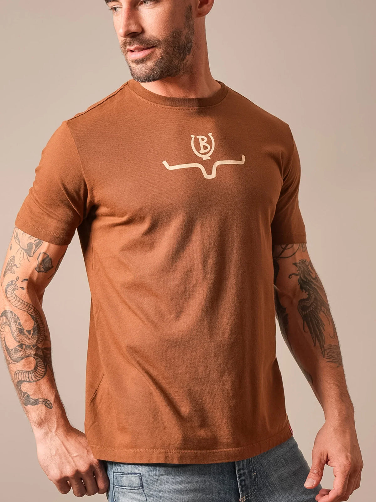 Kimes Ranch Lucky B Saddle shirt in Dark Brown with a chest graphic of a horseshoe and longhorn horns