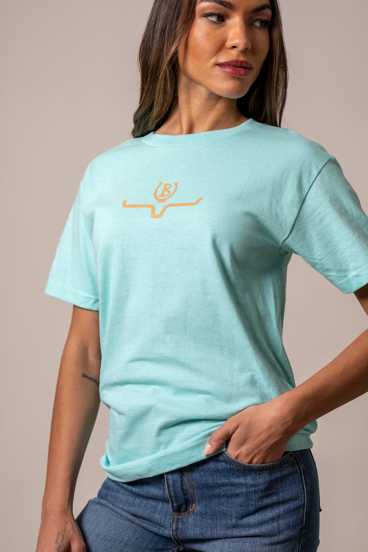 Kimes Ranch Lucky B Saddle shirt in Light Blue with a small orange logo on the chest