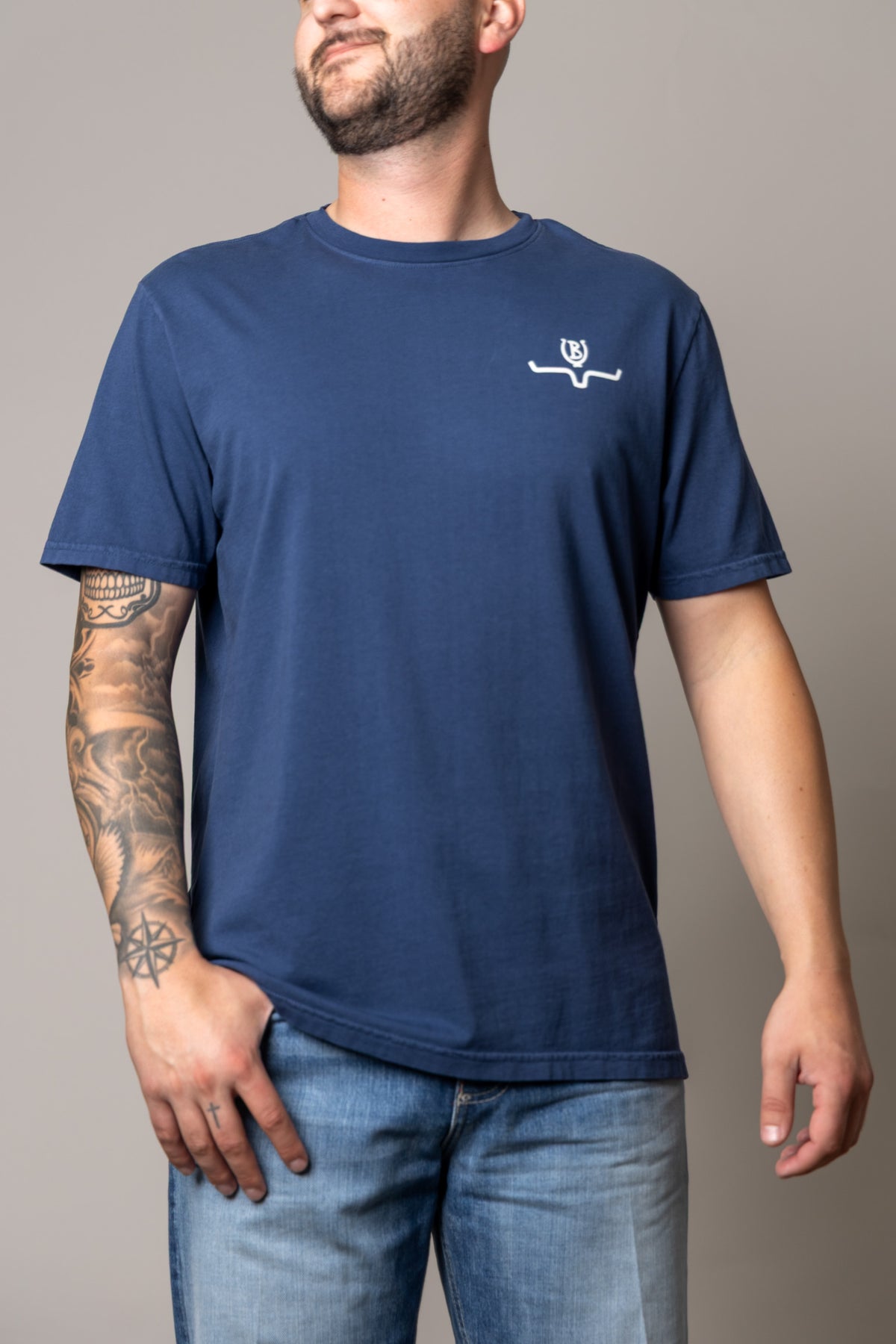 Kimes Ranch Lucky B Statewide shirt in Indigo with a crew neck and short sleeves and a white logo on the chest