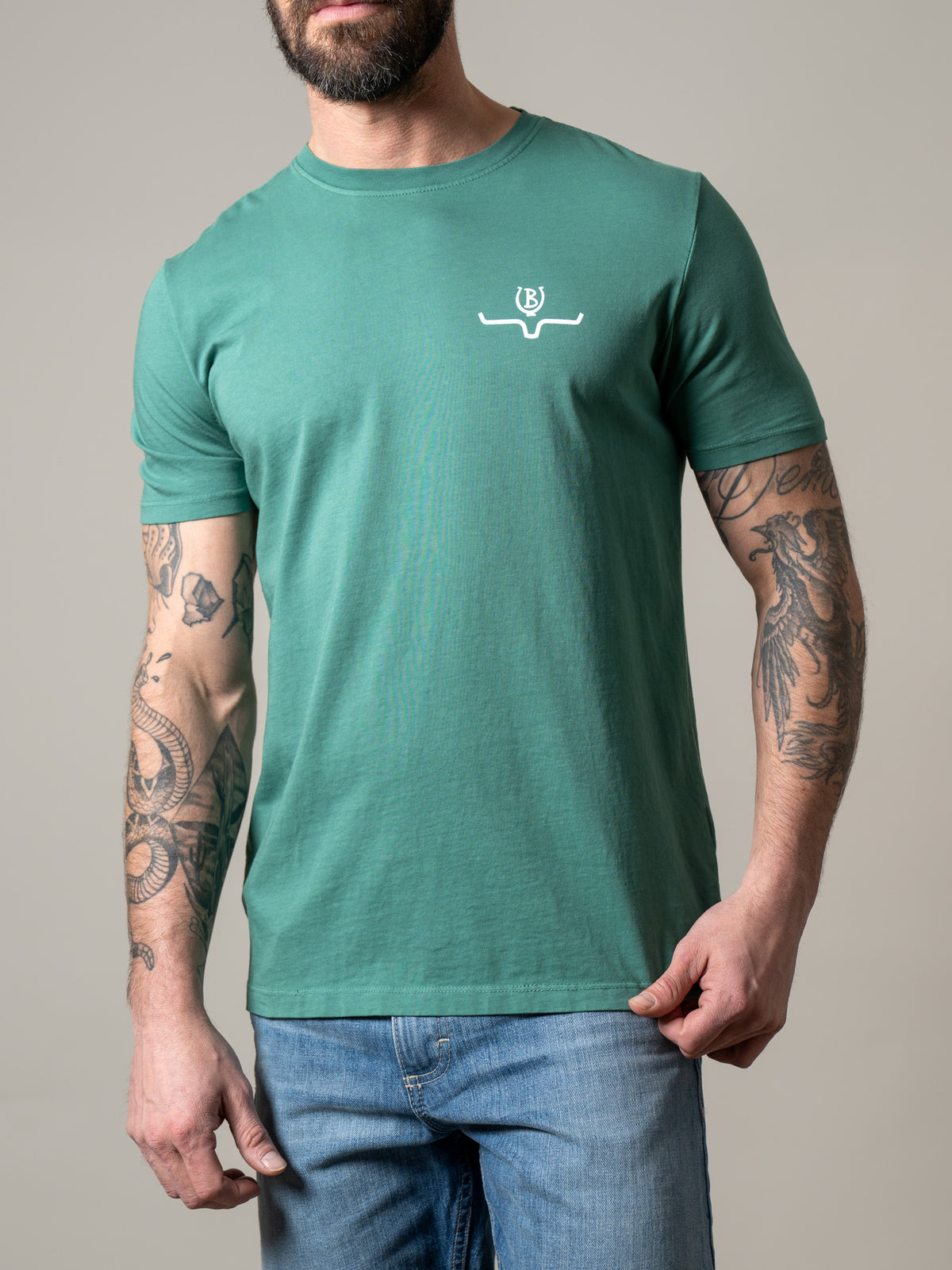 Kimes Ranch Lucky B Sun Had Just Risen shirt in Green with a white logo on the chest