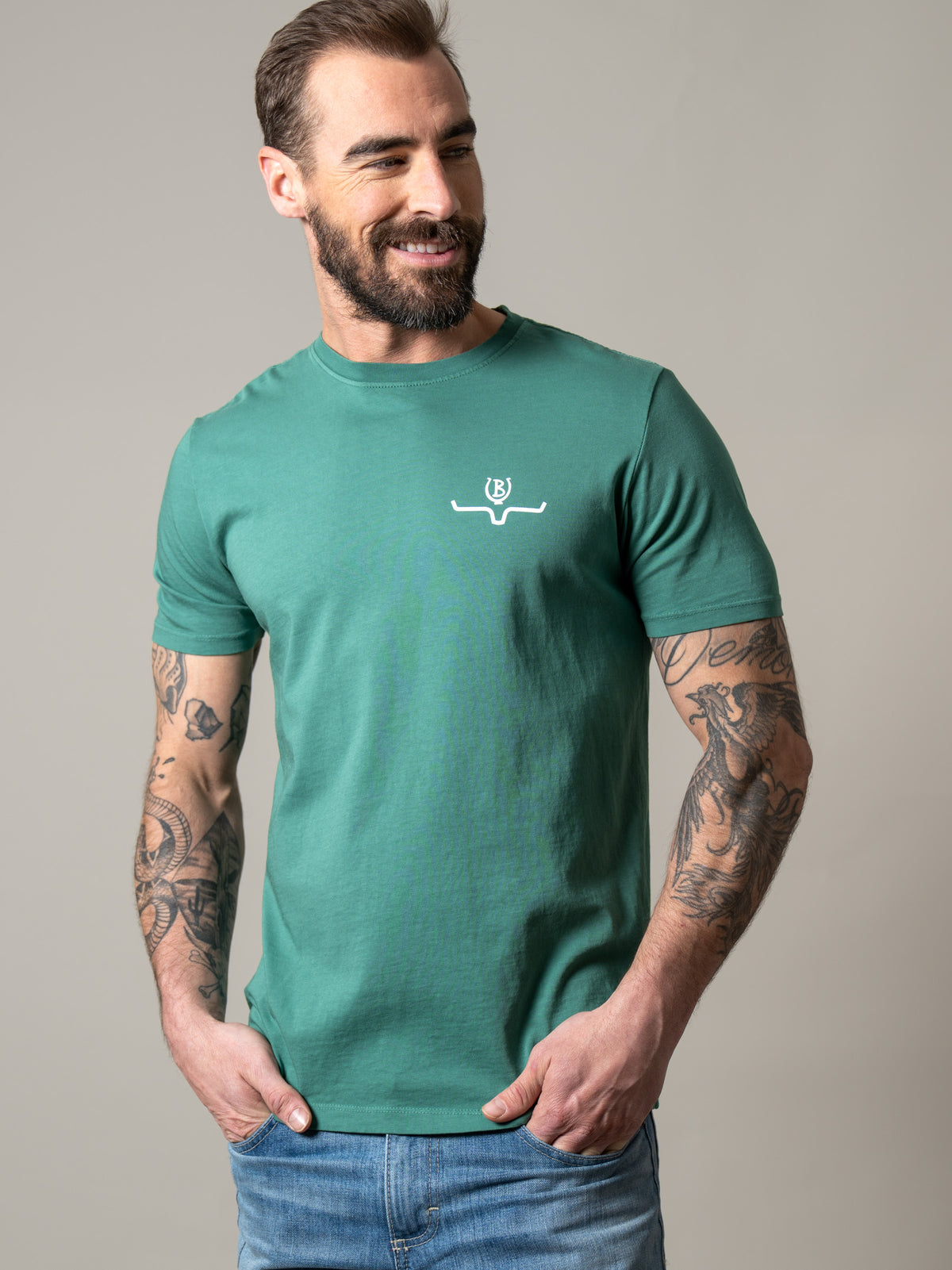 Kimes Ranch Lucky B Sun Had Just Risen shirt in Green with a white logo on the chest