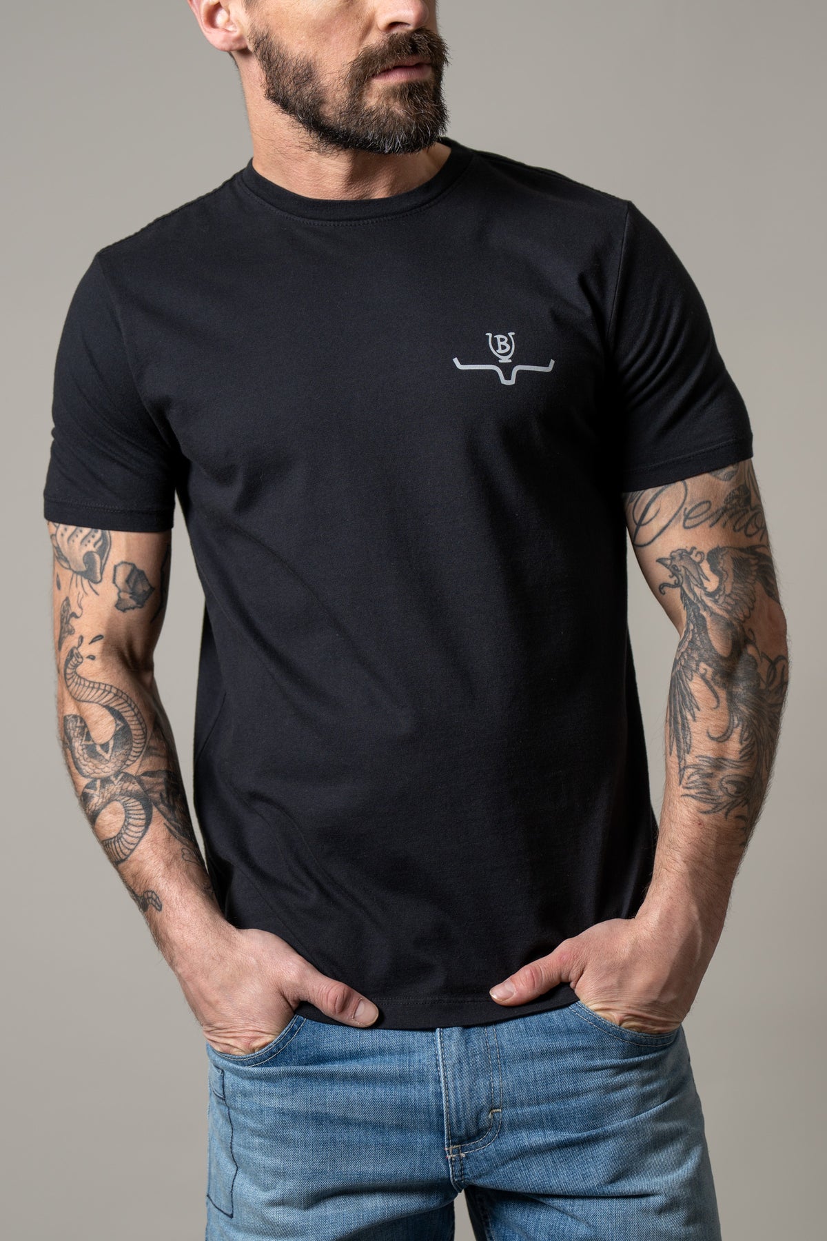 Kimes Ranch Lucky B Tuned shirt in Black with a small white Kimes Ranch logo on the chest