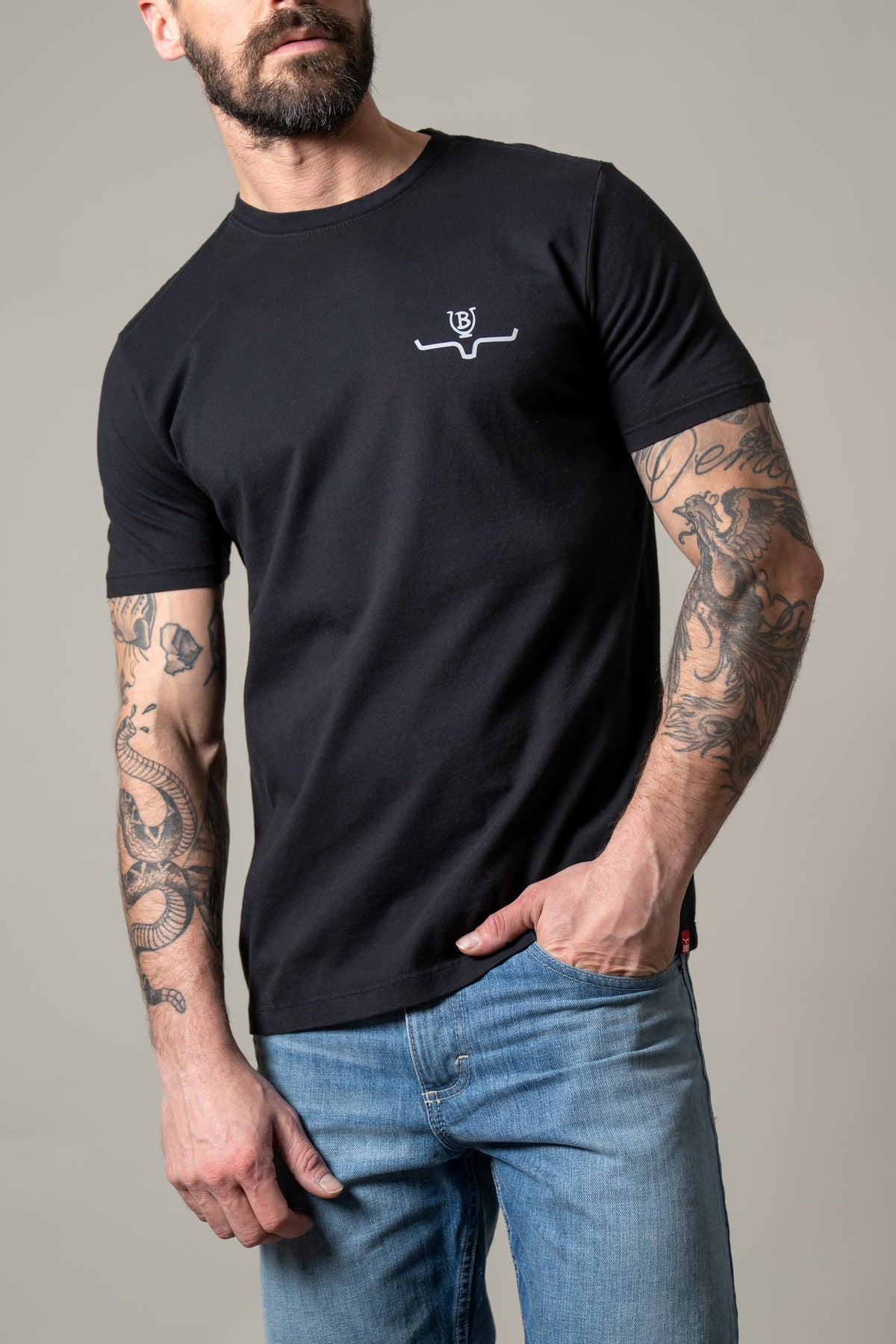 Kimes Ranch Lucky B Tuned shirt in Black with a white Kimes Ranch logo on the chest