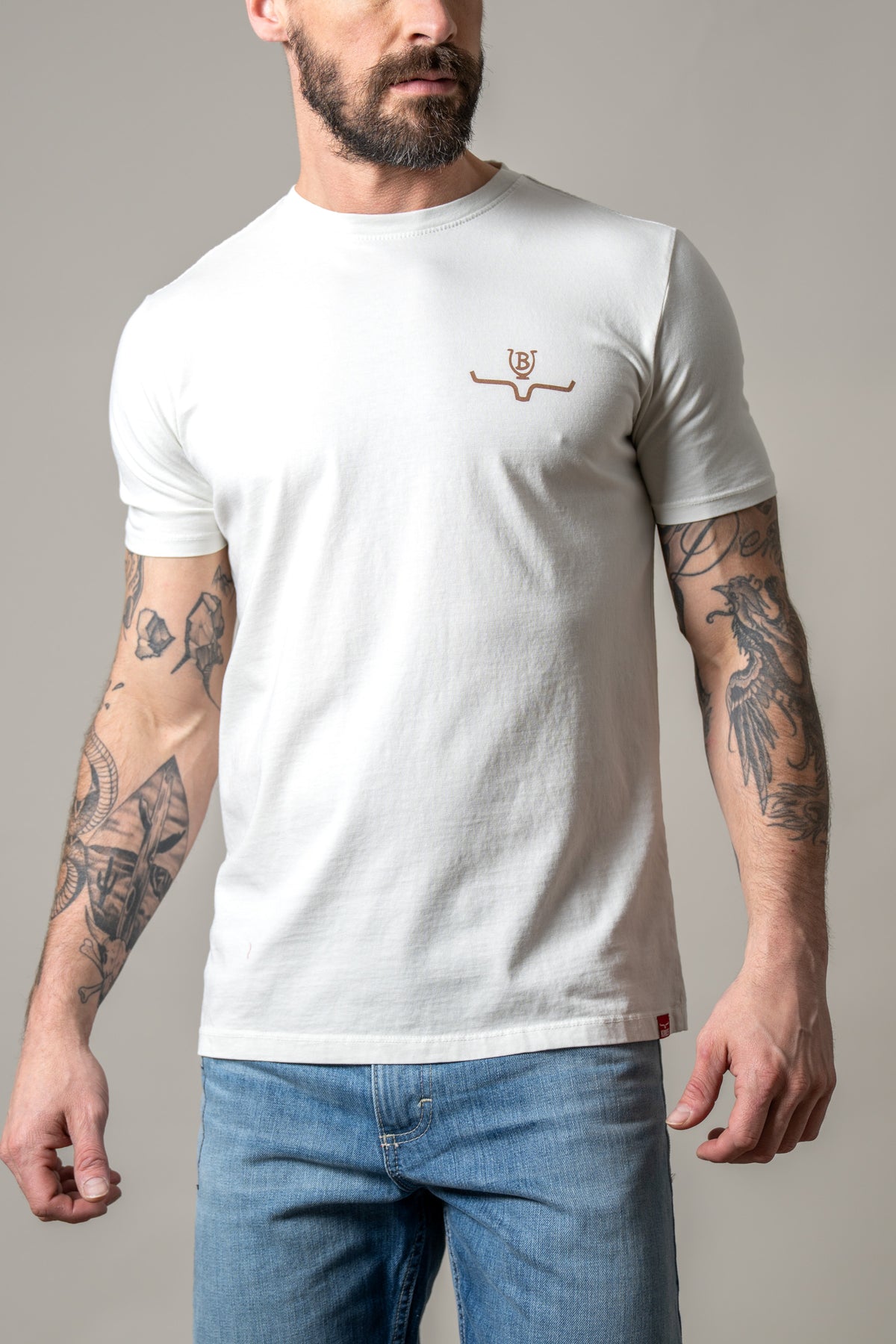 Kimes Ranch Lucky B Tuned short sleeve shirt in Natural with a chest logo