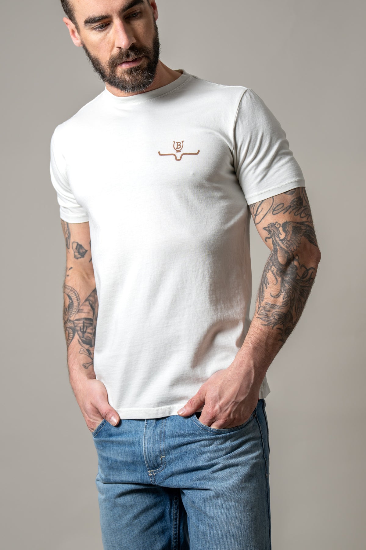 Kimes Ranch Lucky B Tuned short sleeve shirt in Natural with a small embroidered logo on the chest