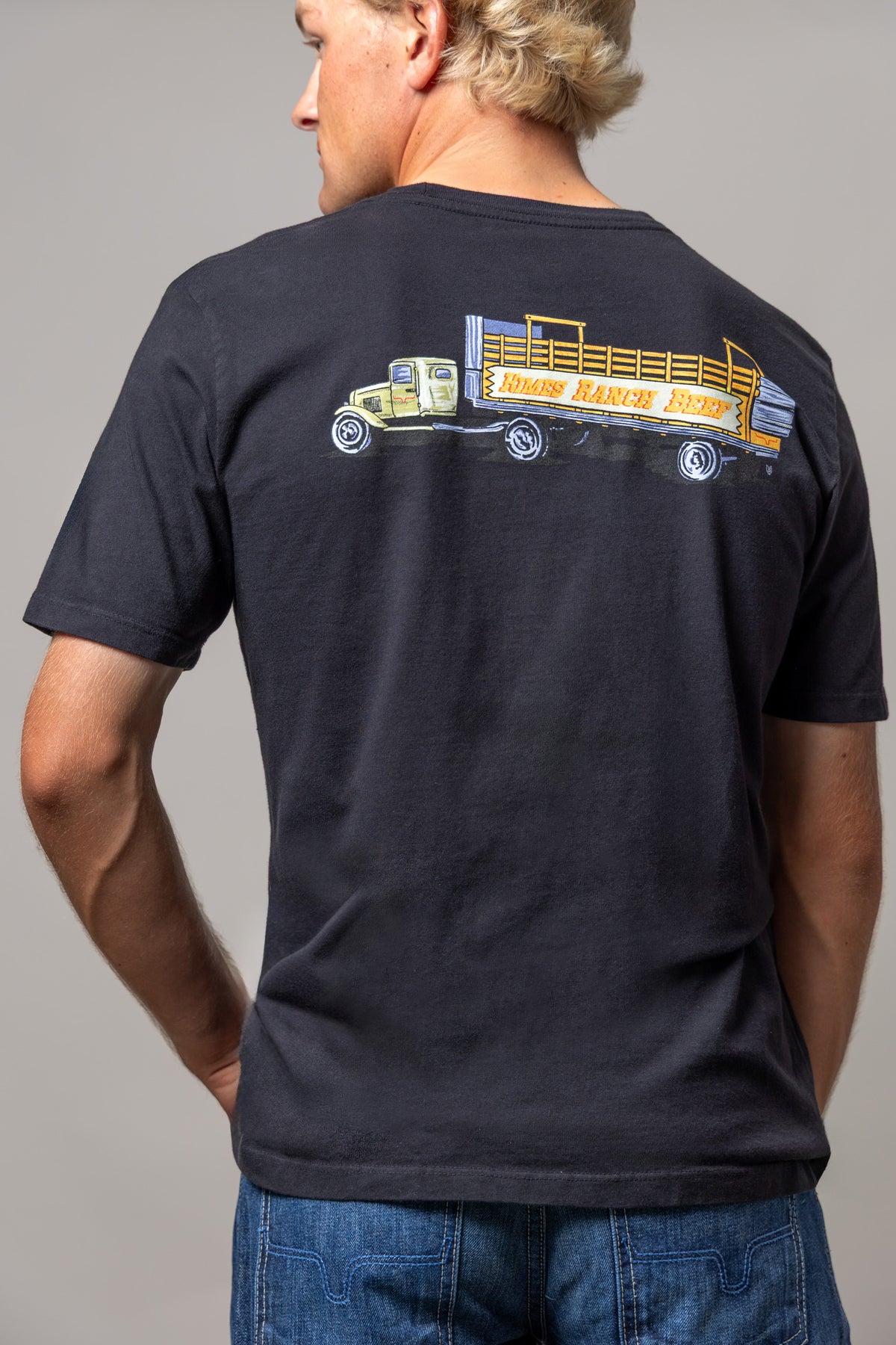 Kimes Ranch Lucky B Vintage Hauler, back view, shirt with a back graphic of a vintage cattle truck
