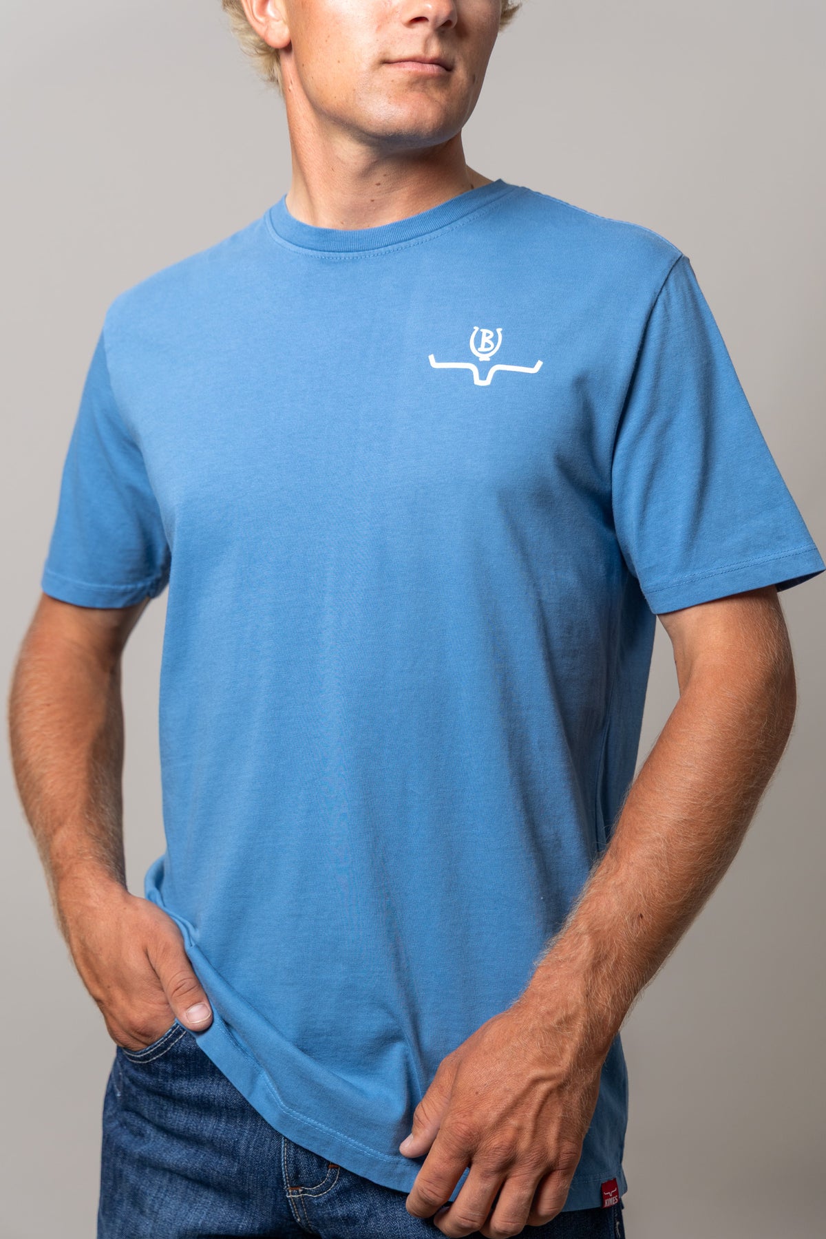 Kimes Ranch Lucky B Vintage Hauler shirt in Mid Blue with a white Kimes Ranch logo on the chest
