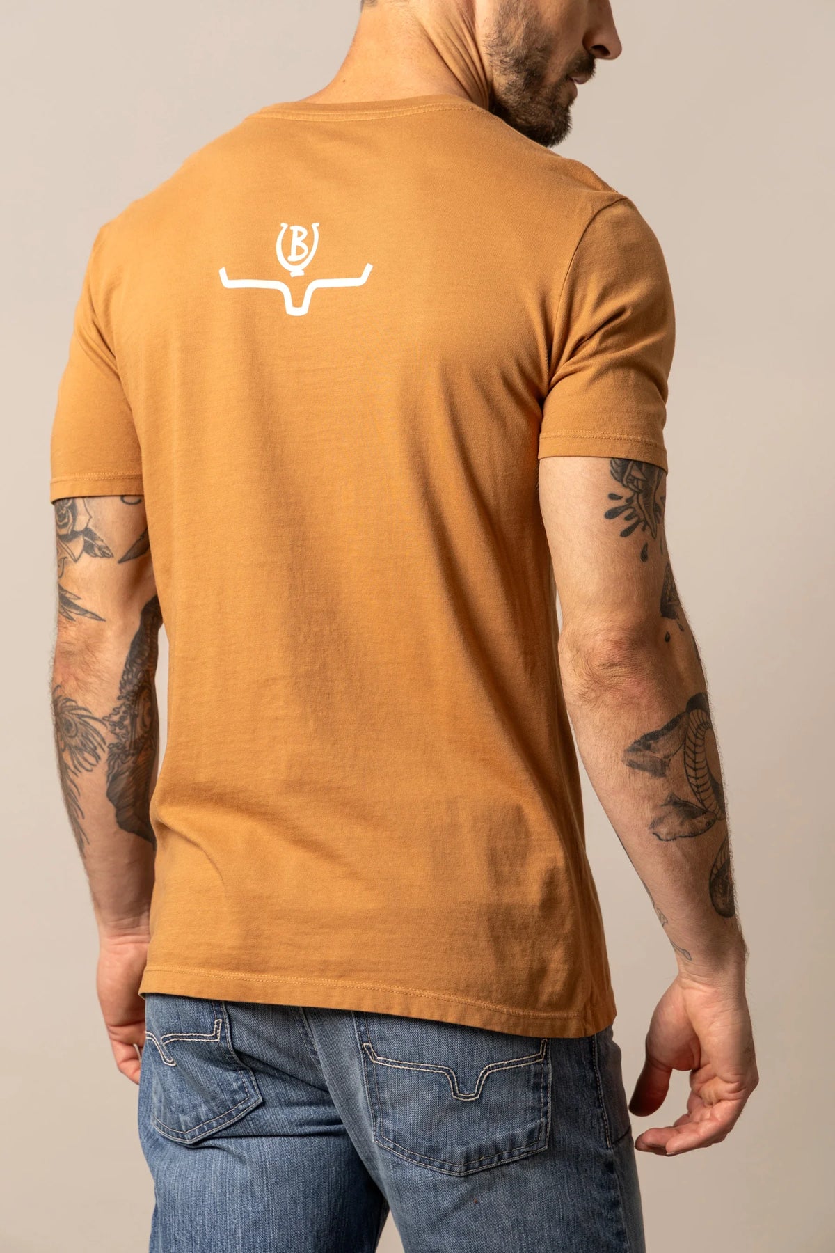 Kimes Ranch Lucky B Truck shirt in Work Wear Brown, back view, with a white logo on the back