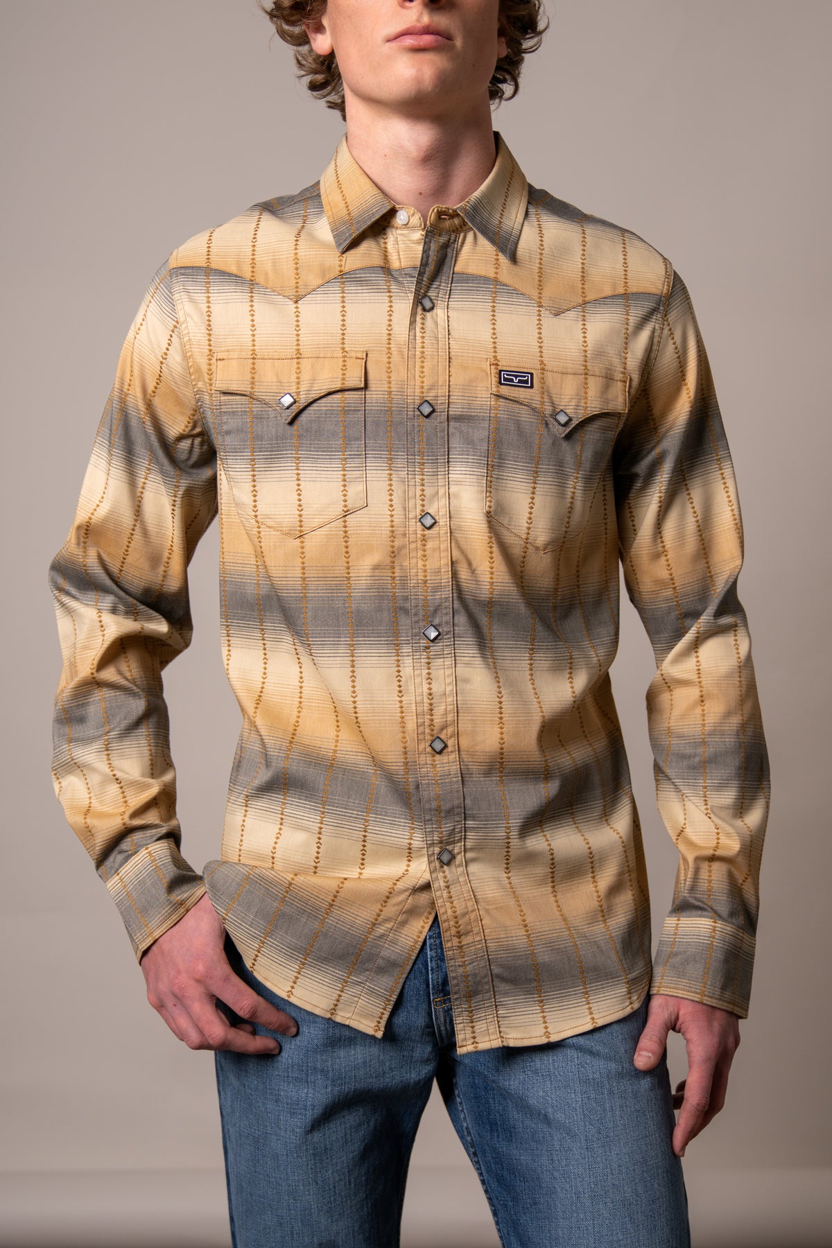 Kimes Ranch Lyle dress shirt in Black with a plaid pattern, snap front closure, and two chest pockets