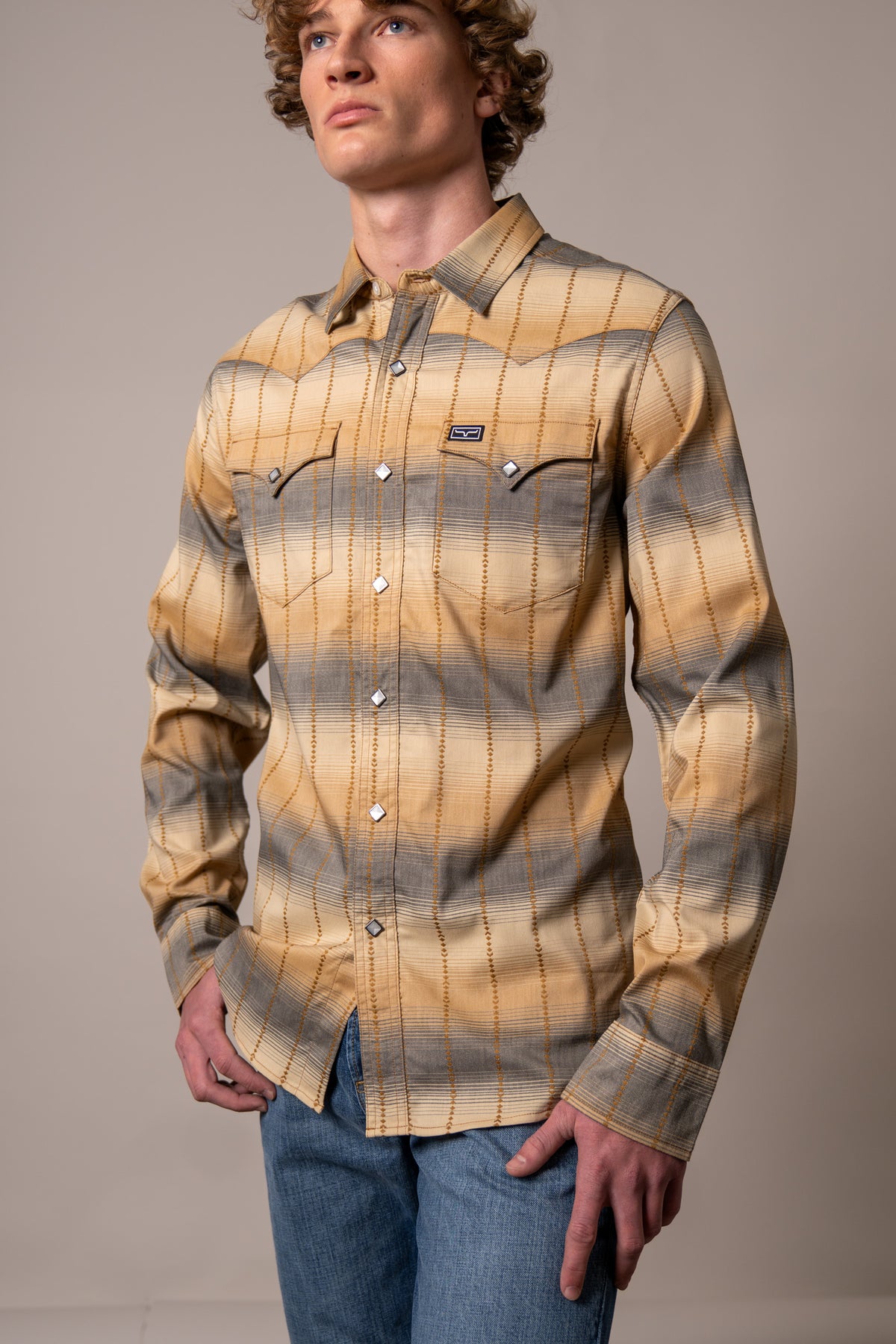Kimes Ranch Lyle long sleeve dress shirt in Black with a plaid pattern and two chest pockets