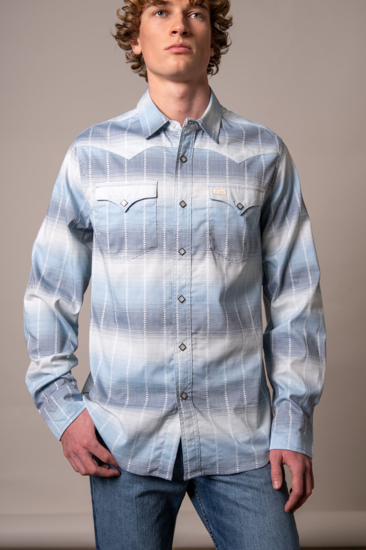 Kimes Ranch Lyle long sleeve dress shirt in Blue with a plaid pattern and two chest pockets