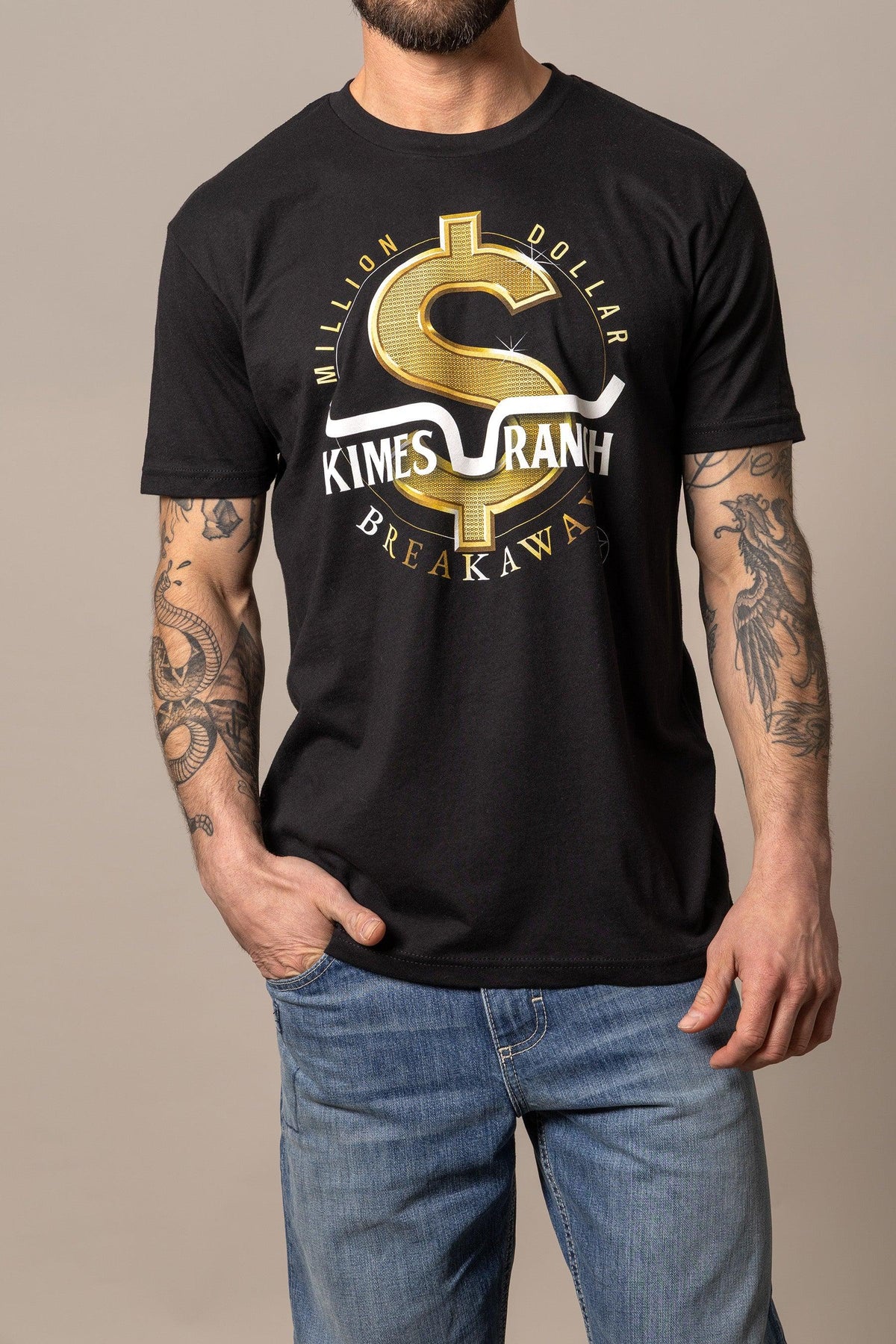 Kimes Ranch Men's MDB Tee in black with a gold dollar sign graphic and Million Dollar Breakaway text
