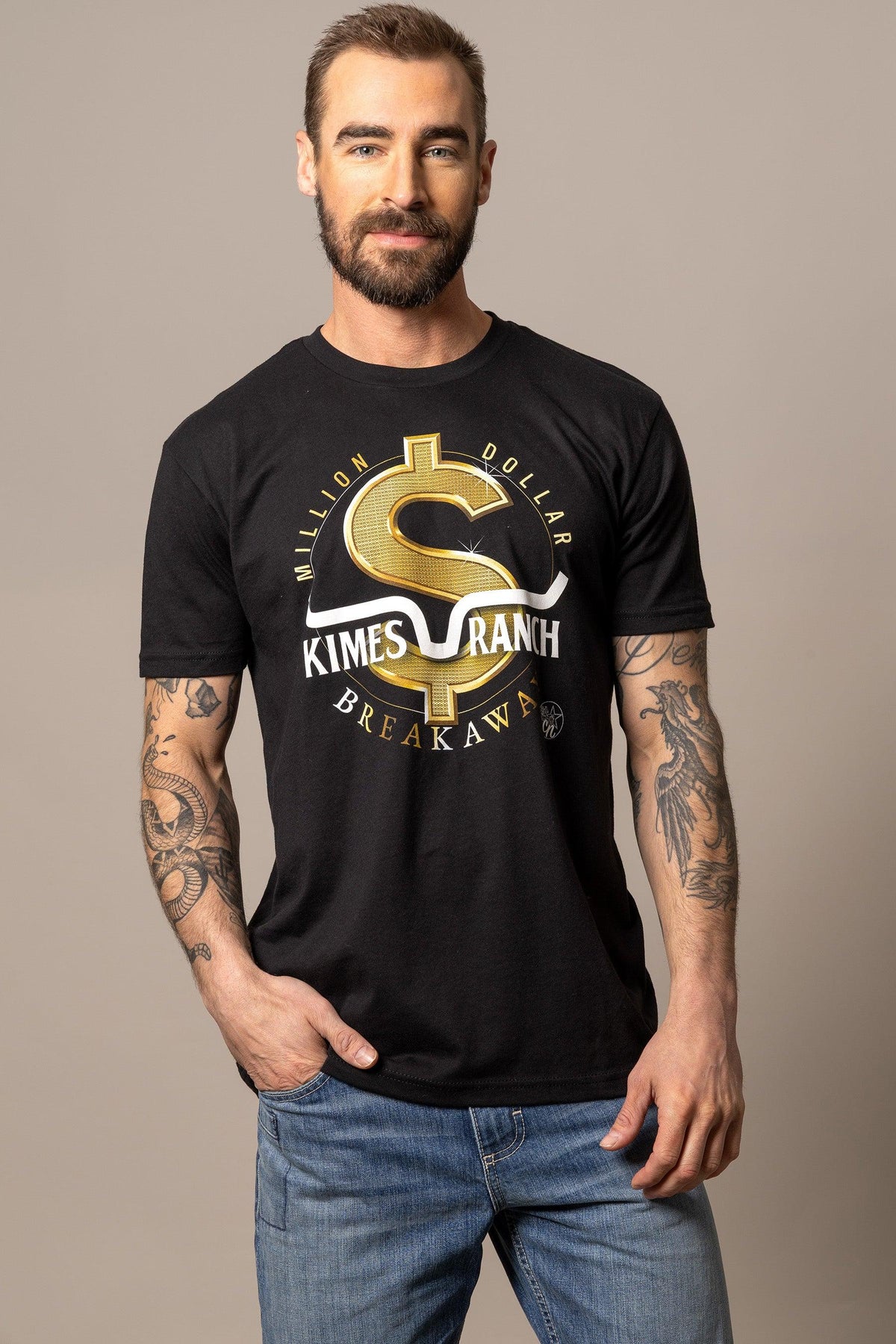Kimes Ranch Men's MDB Tee in black with a gold dollar sign graphic and 'Million Dollar Breakaway' text