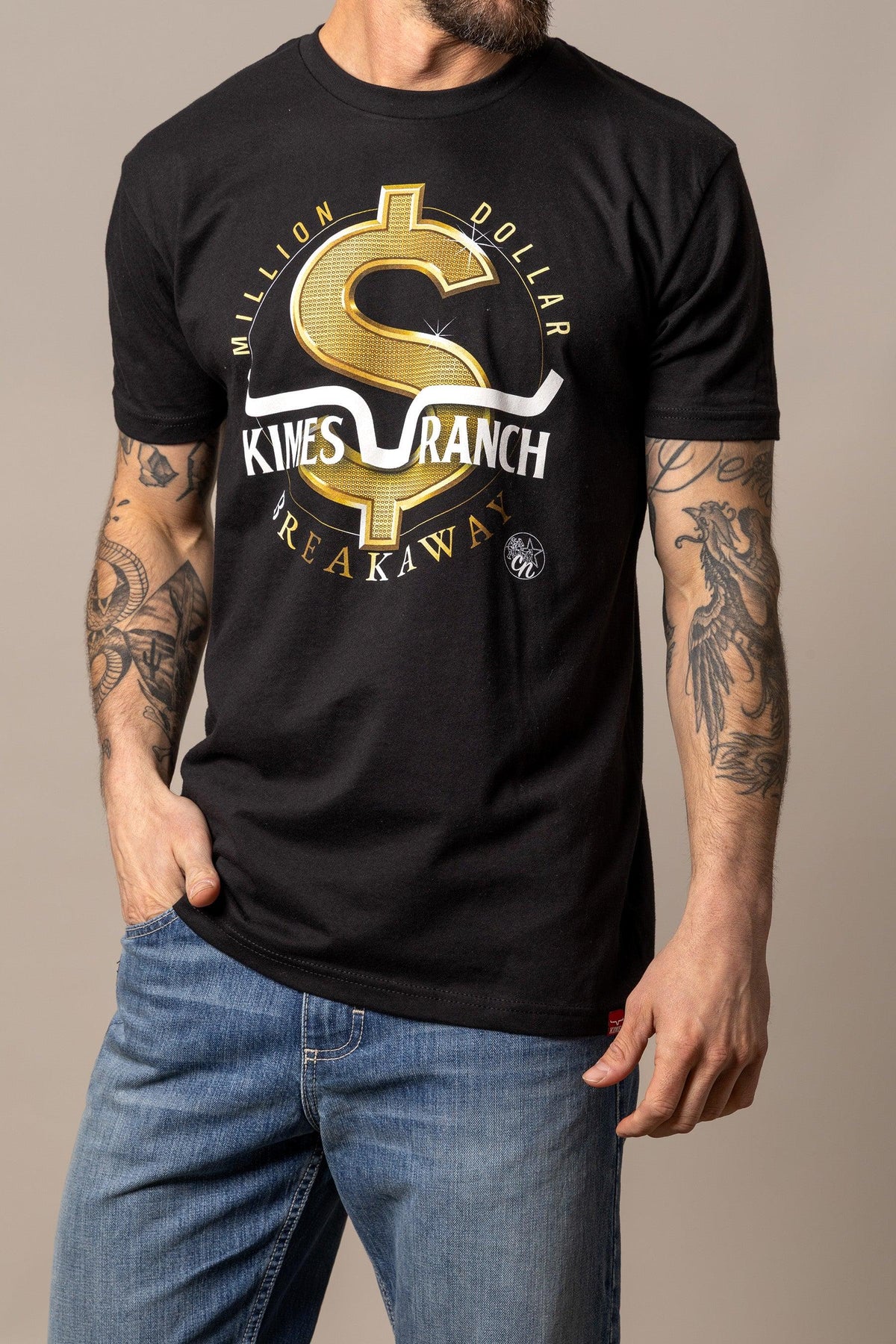 Kimes Ranch Men's MDB Tee in Black with a gold dollar sign graphic and 'Million Dollar Breakaway' text