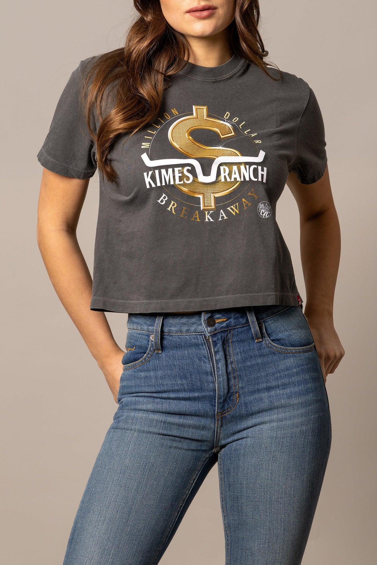 Kimes Ranch MDB Women's Crop Tee in Pepper with a gold dollar sign graphic and Million Dollar Breakaway text