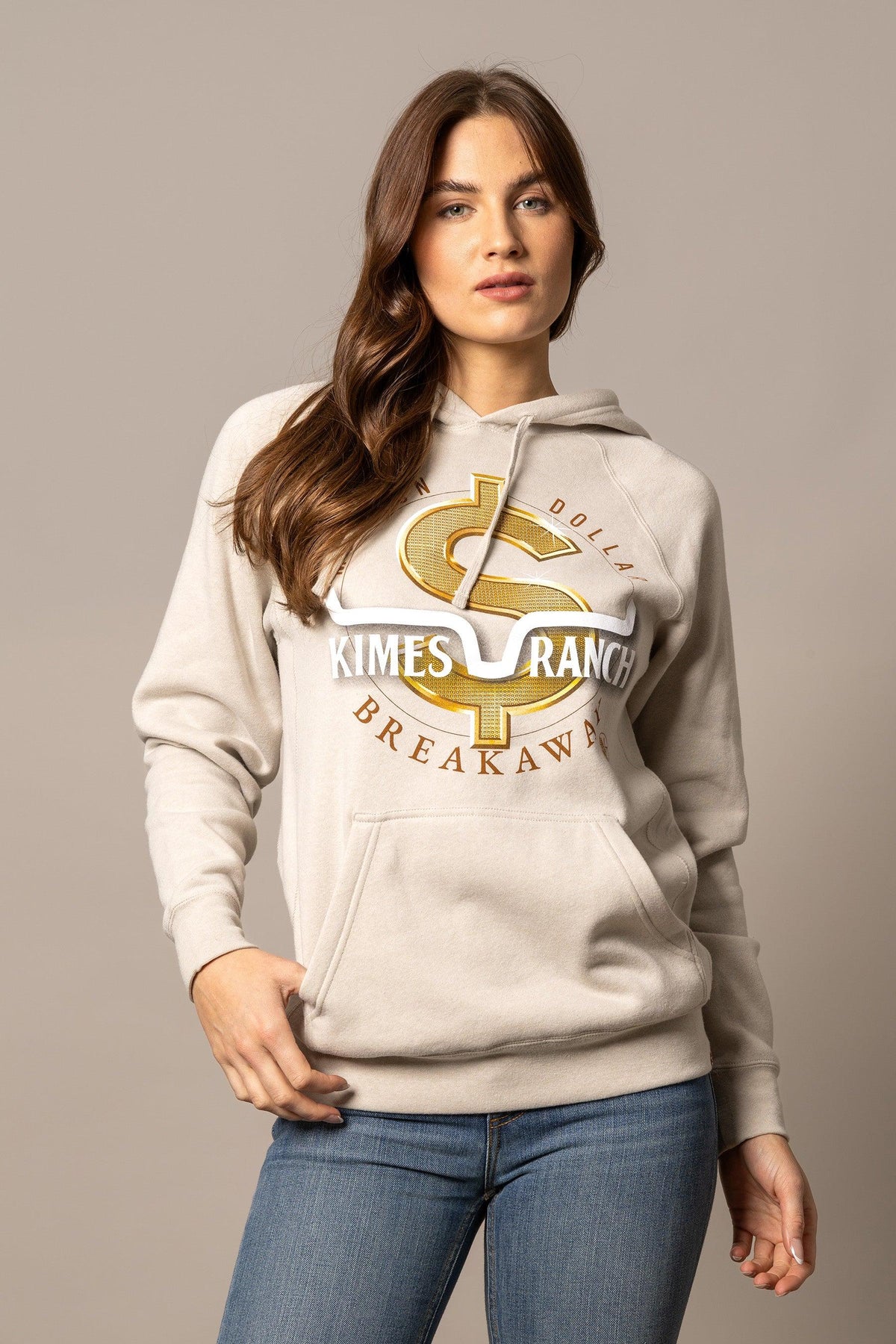 Kimes Ranch MDB Pullover hoodie in oatmeal with a gold dollar sign graphic and Kimes Ranch Breakaway logo